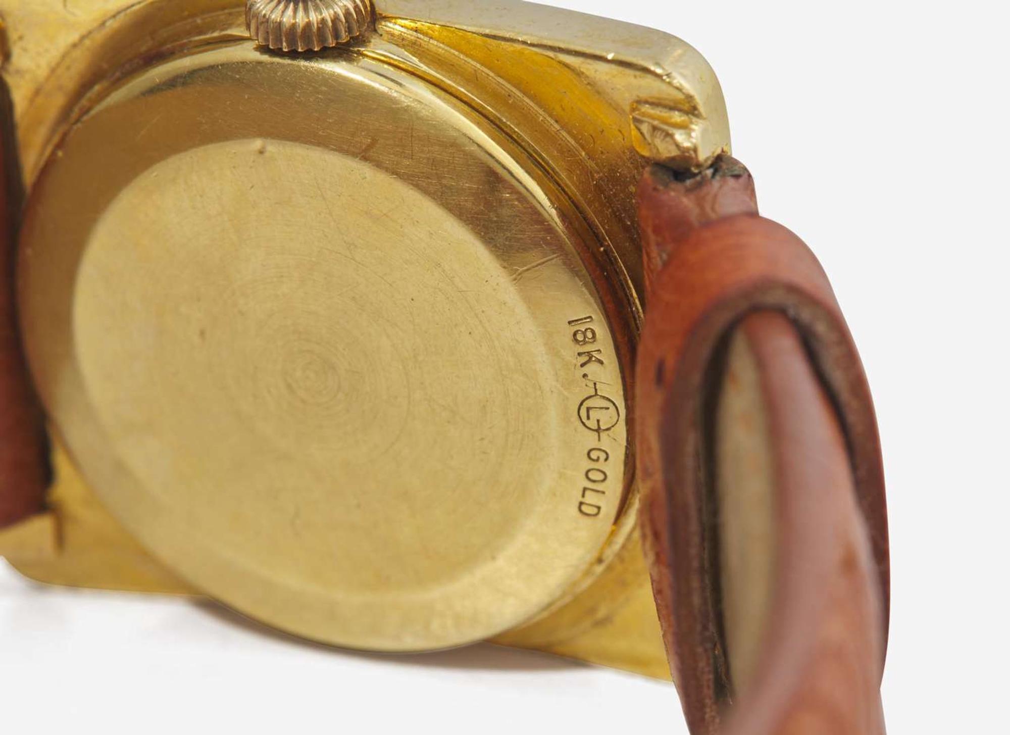 A Ladies 18K Yellow Gold and Diamond LeCoultre Watch