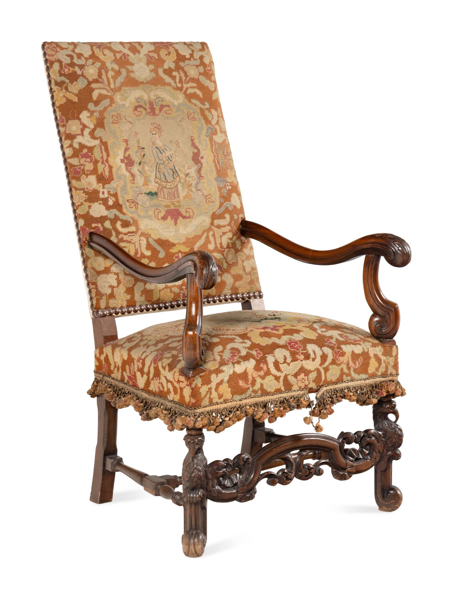 A William and Mary Style Carved Walnut Tapestry-Upholstered Armchair