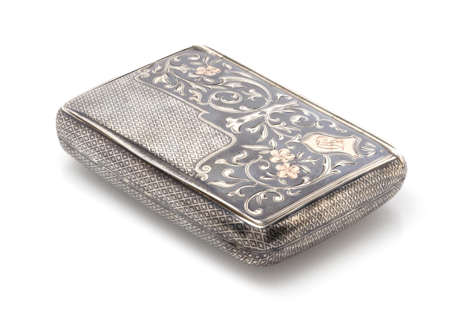 An Austro-Hungarian Niello Silver Cigarette Case, Maker's mark JL, Vienna, late 19th/early 20th century, of rectangular form, the lid d