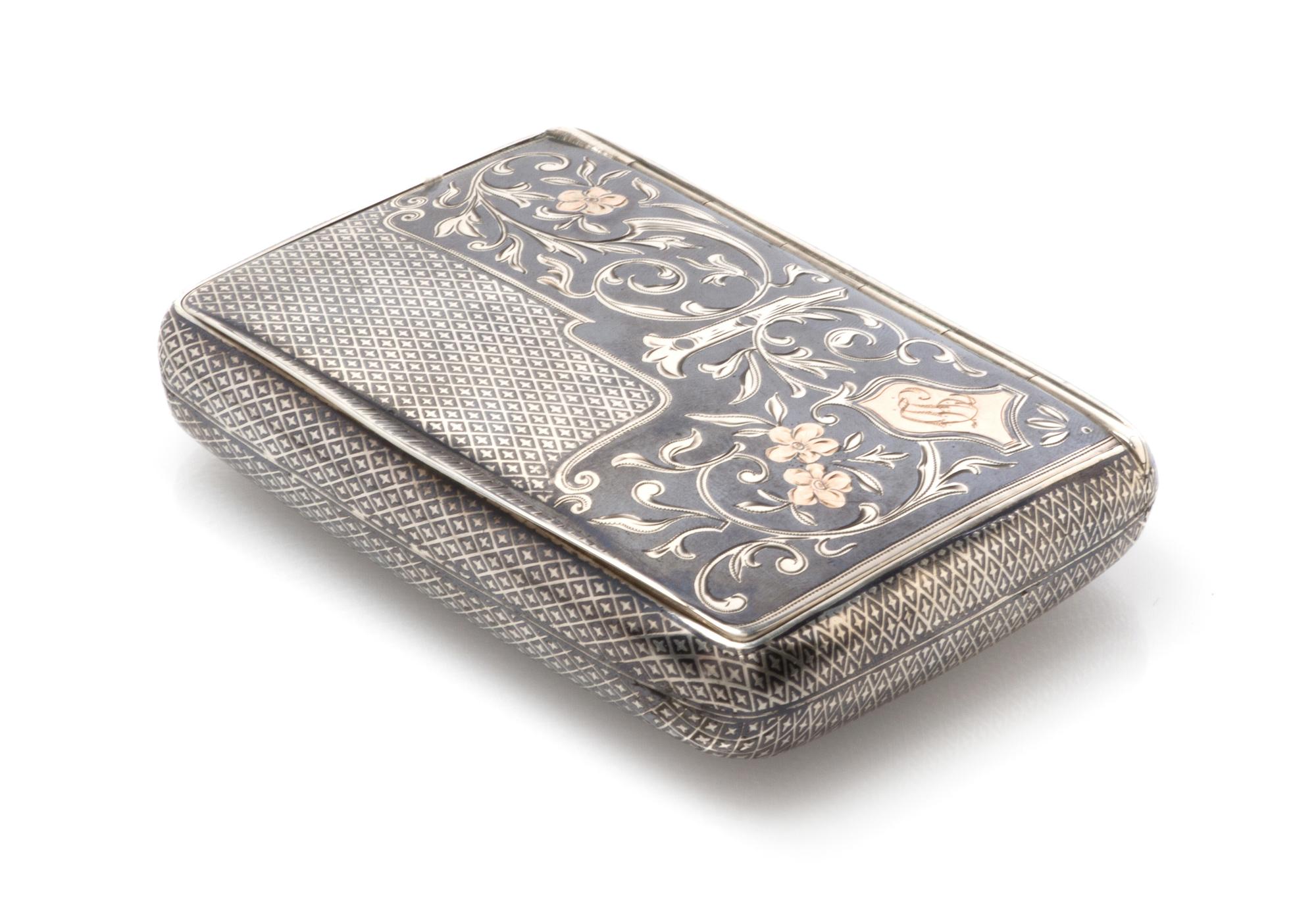 An Austro-Hungarian Niello Silver Cigarette Case, Maker's mark JL, Vienna, late 19th/early 20th century, of rectangular form, the lid d
