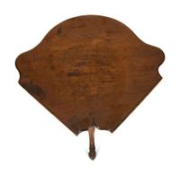 An Italian Rococo Carved Walnut Tripod Stand