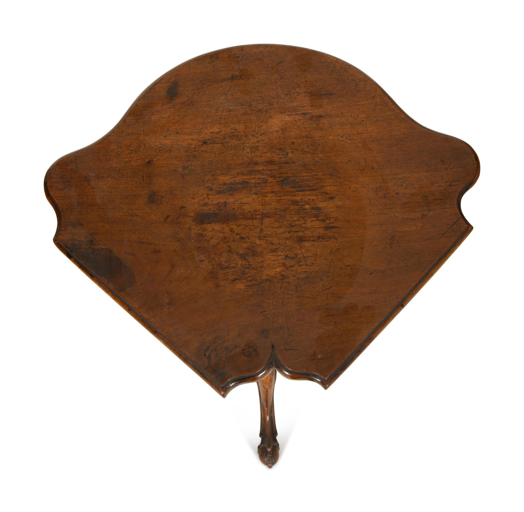 An Italian Rococo Carved Walnut Tripod Stand