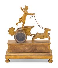 An Empire Style Gilt Bronze Figural Clock