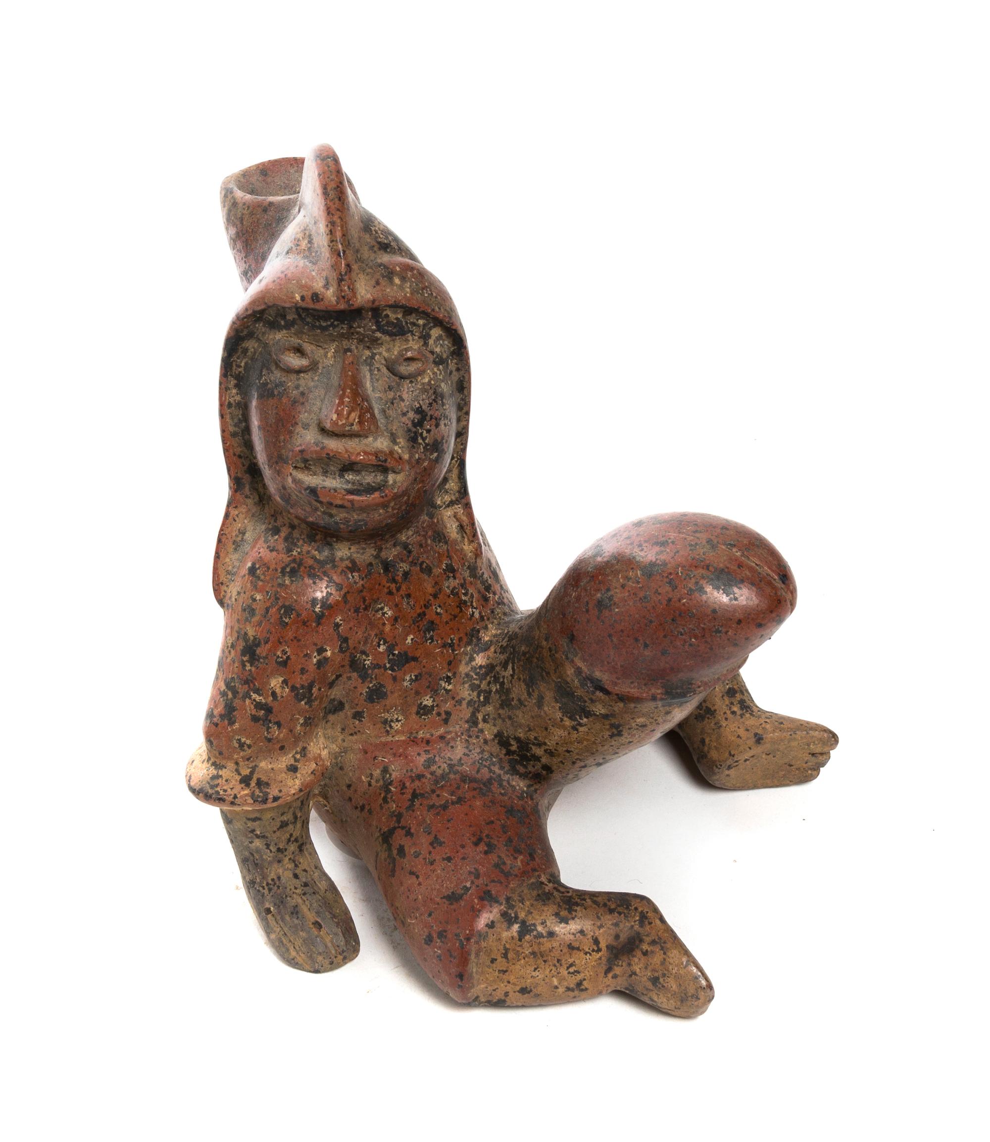 A Pre-Columbian Terracotta Figure, Colima, Height 7 3/4 inches.