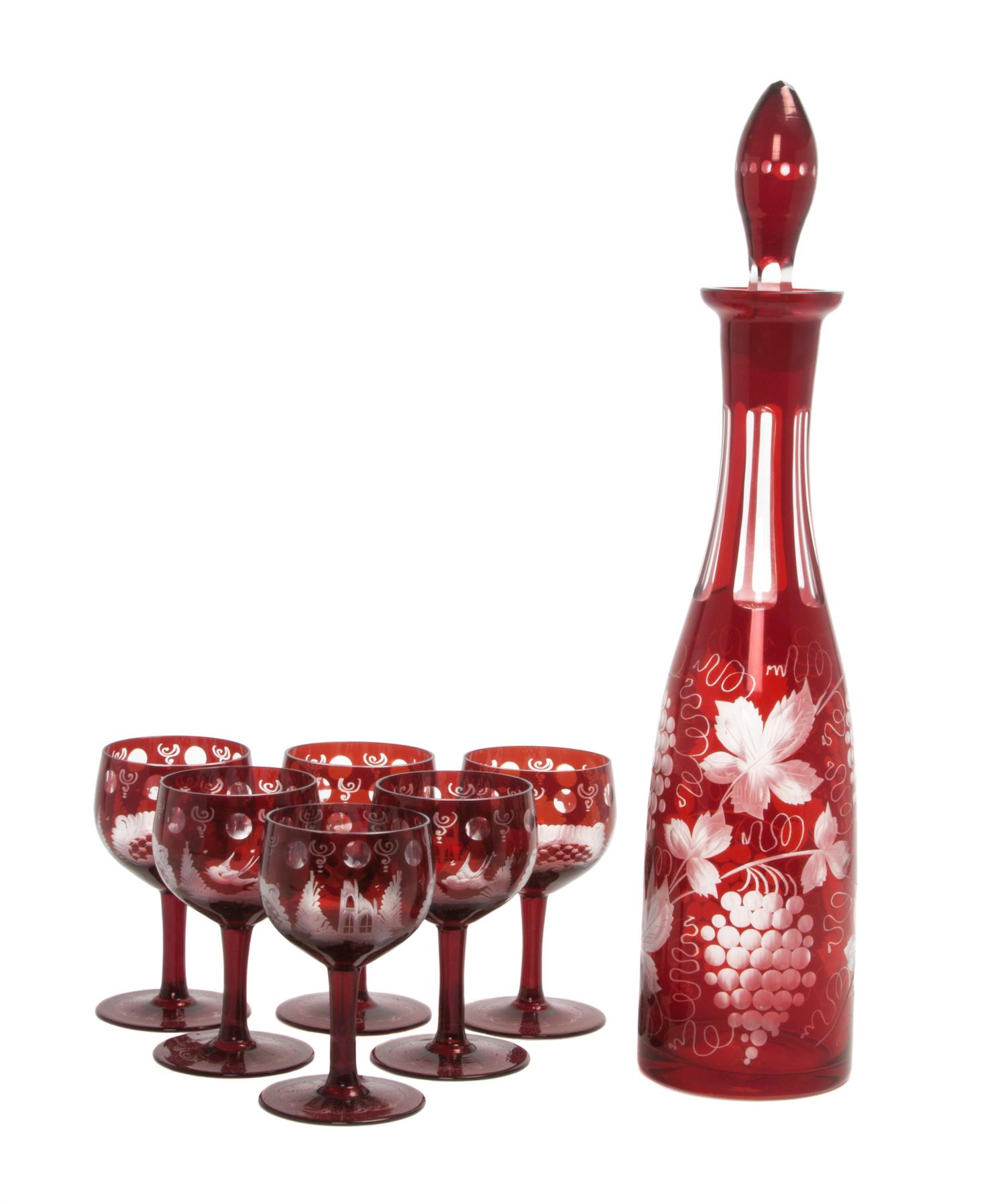 A Bohemian Ruby Cut to Clear Glass Decanter Set Height of first 15 3/4 inches.