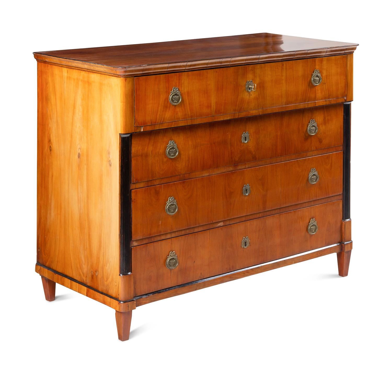 An Austrian Neoclassical Part-Ebonized Walnut Commode