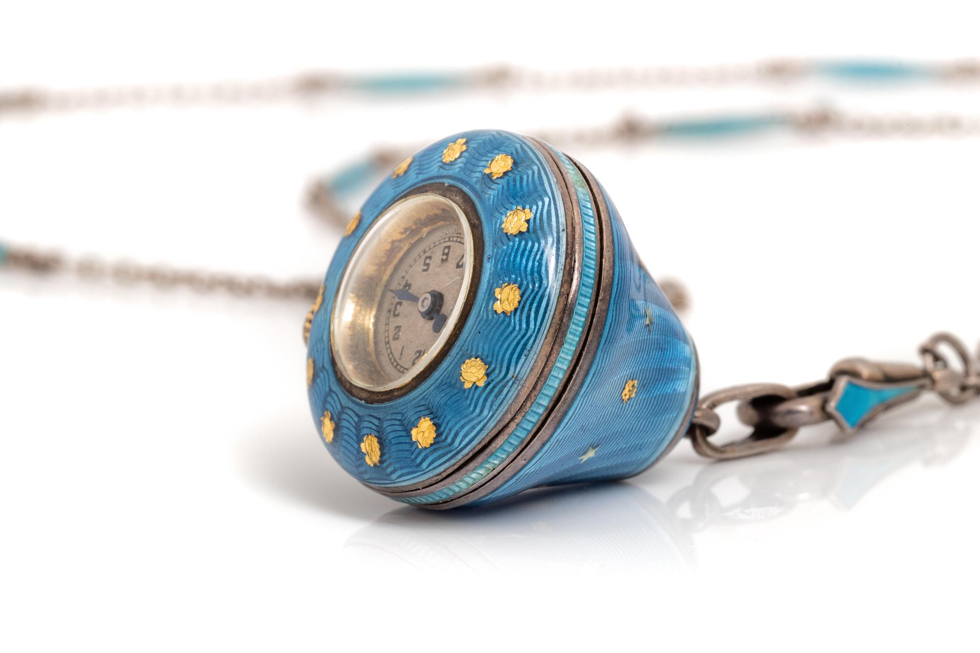 A Silver and Enamel Pendant Watch Necklace,