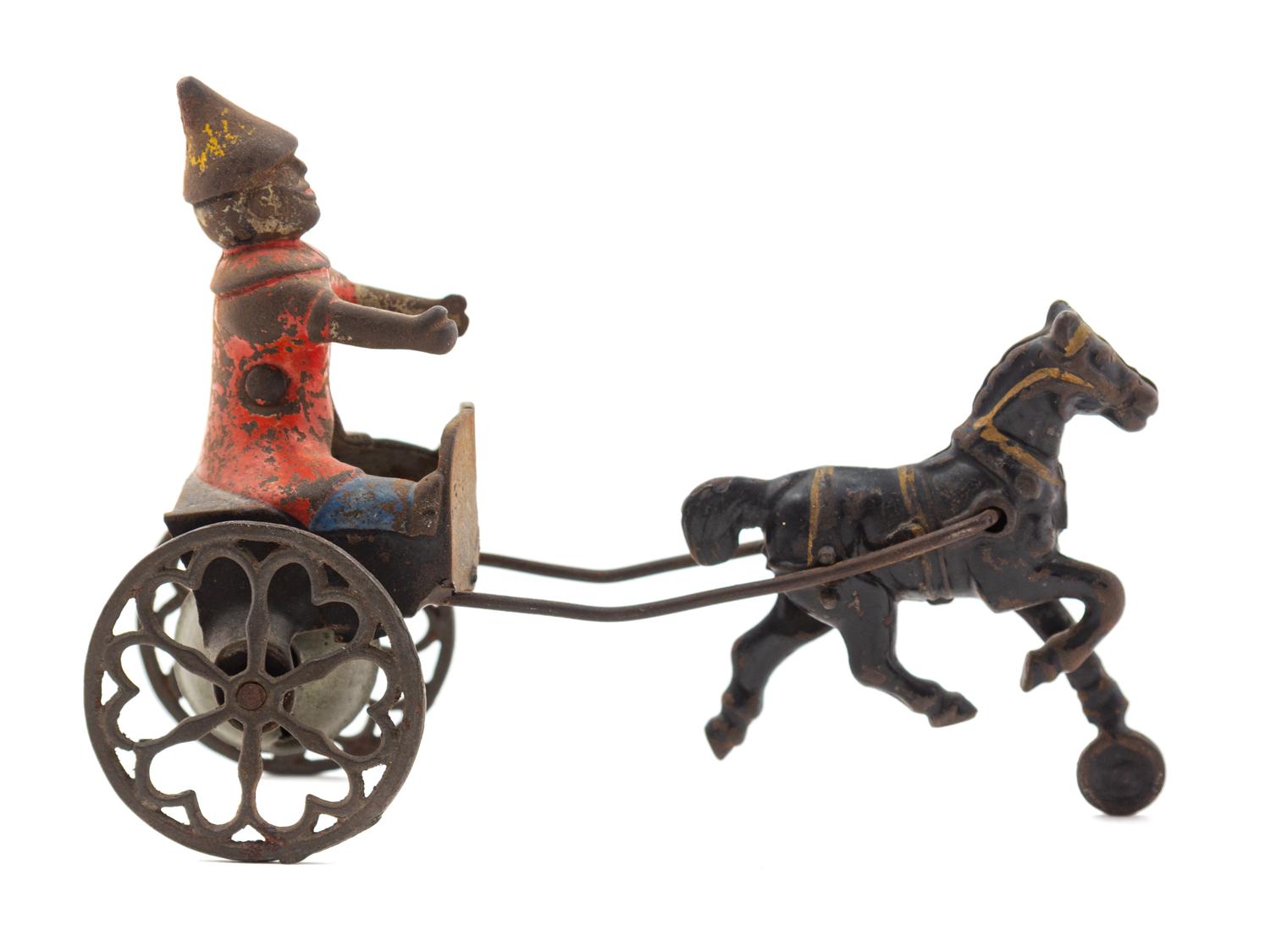 A Gong Bell Co. Horse-Drawn Clown Toy