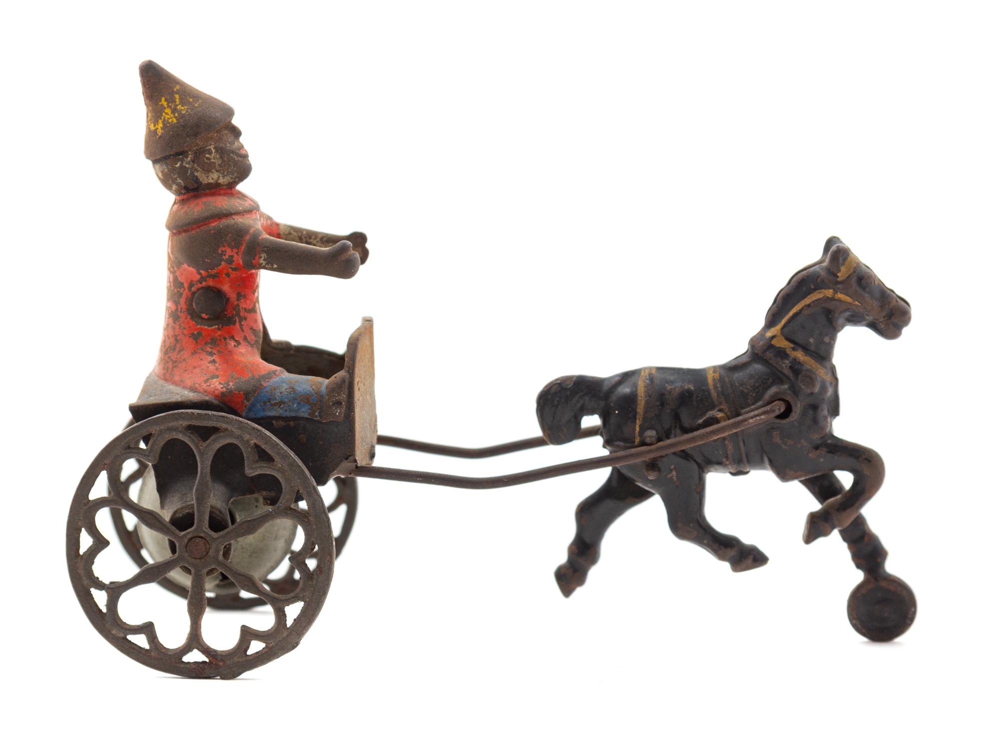 A Gong Bell Co. Horse-Drawn Clown Toy