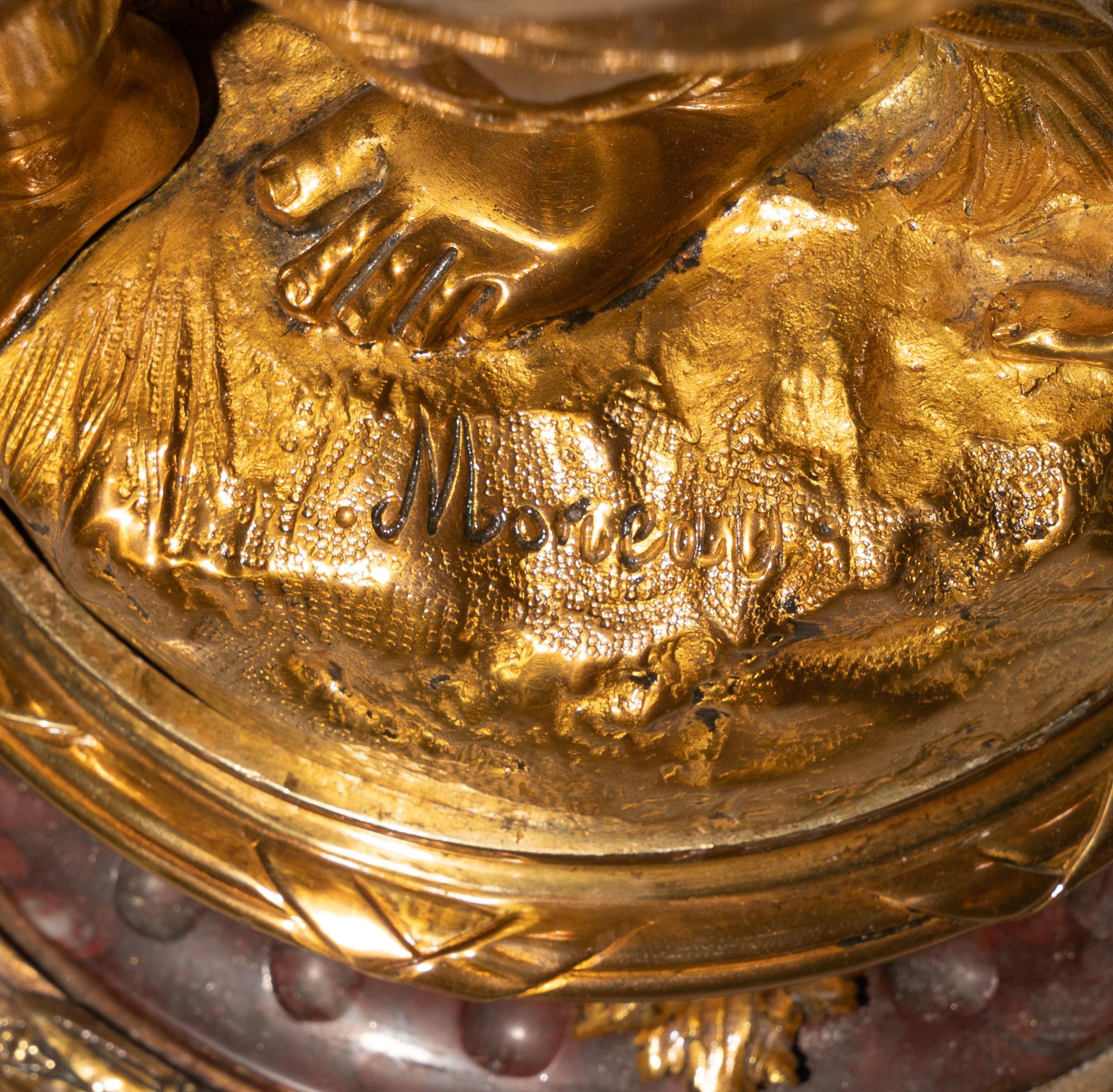 A French Gilt Bronze and Marble Figural Clock