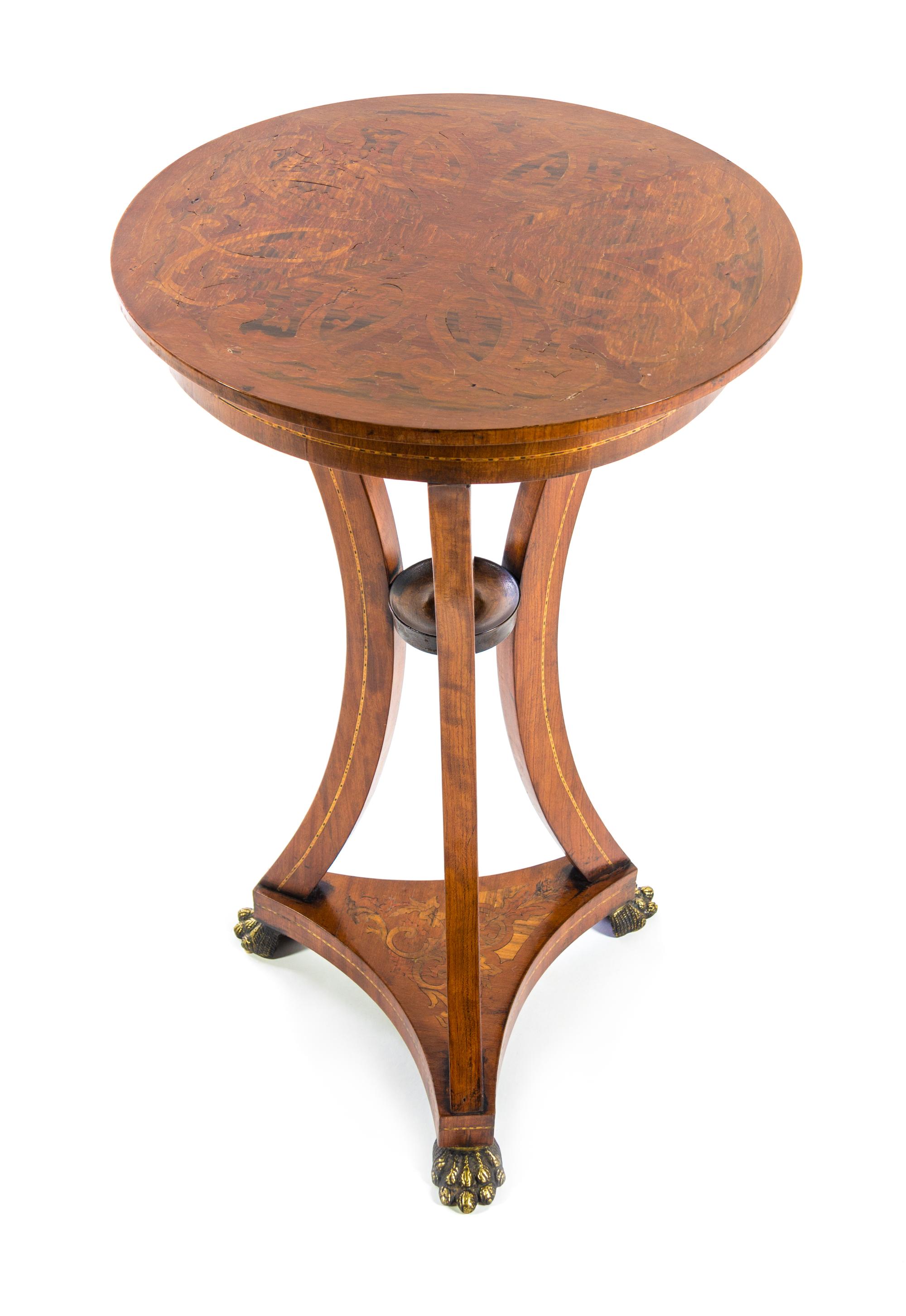 A Continental Marquetry Table Height 30 x diameter of top 17 1/2 inches. — LATE 19TH CENTURY