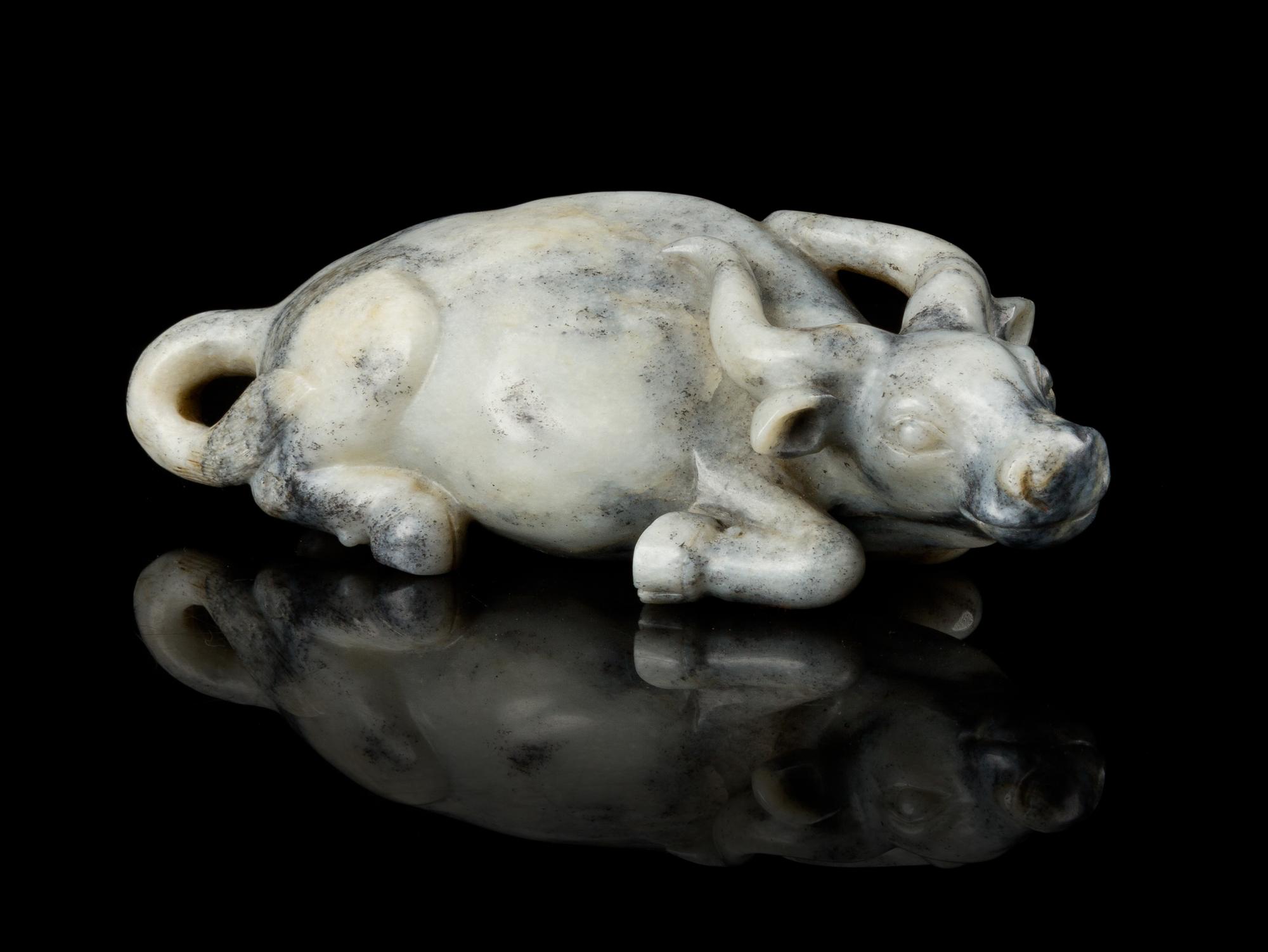 A Grey and White Mottled Jade Figure of a Recumbent Water Buffalo Length 5 1/2 inches. — 18TH CENTURY OR LATER