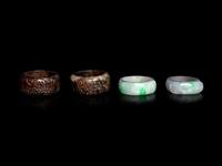 Two Chinese Jadeite Archer's Rings and A Pair of Chinese Hardstone Ring