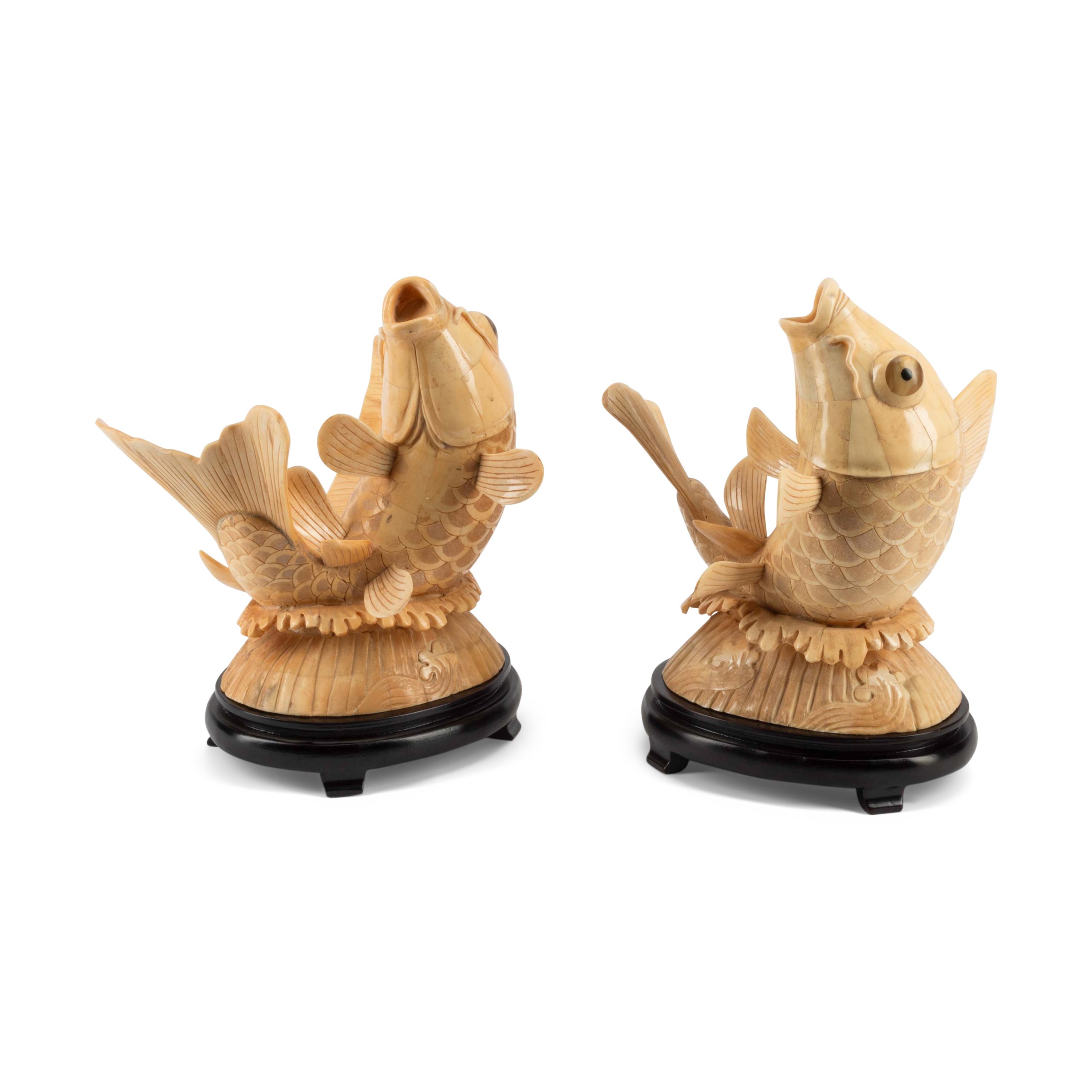 A Pair of Japanese Bone-Veneered Fish Sculptures