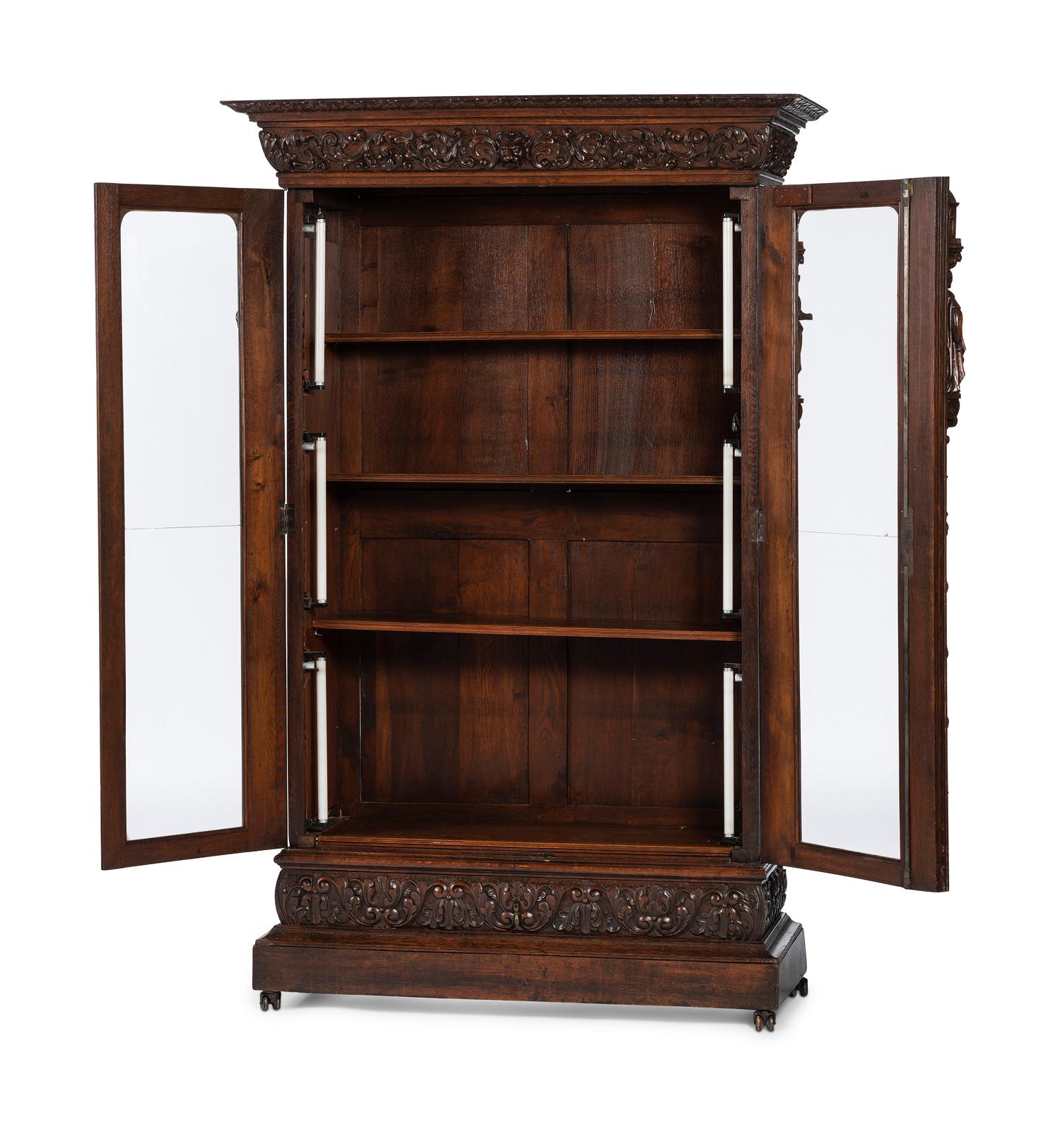 A Renaissance Revival Carved Oak Display Cabinet
