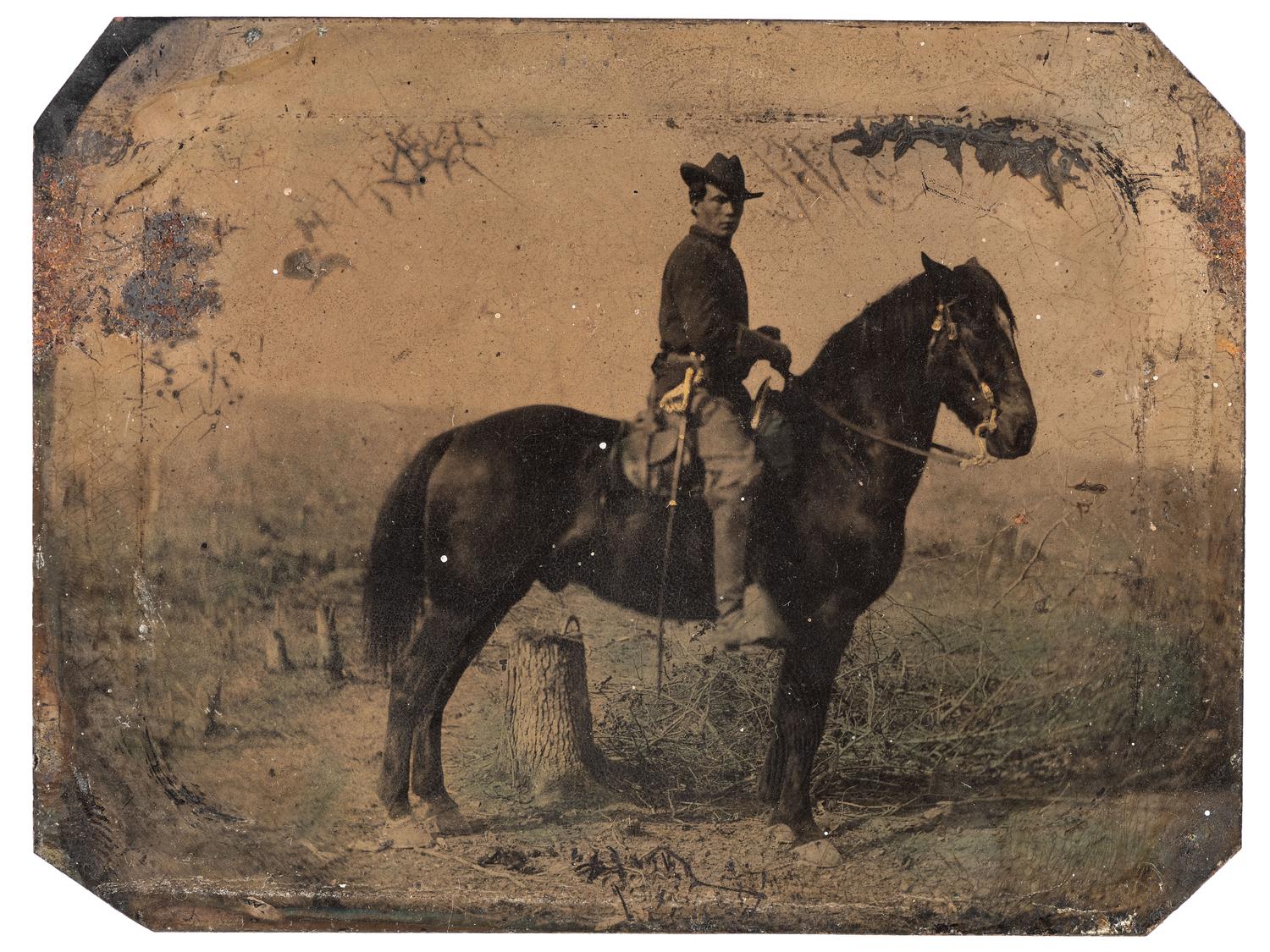 [CIVIL WAR]. Quarter plate tintype of a Federal cavalry soldier on horseback.