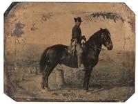 [CIVIL WAR]. Quarter plate tintype of a Federal cavalry soldier on horseback.