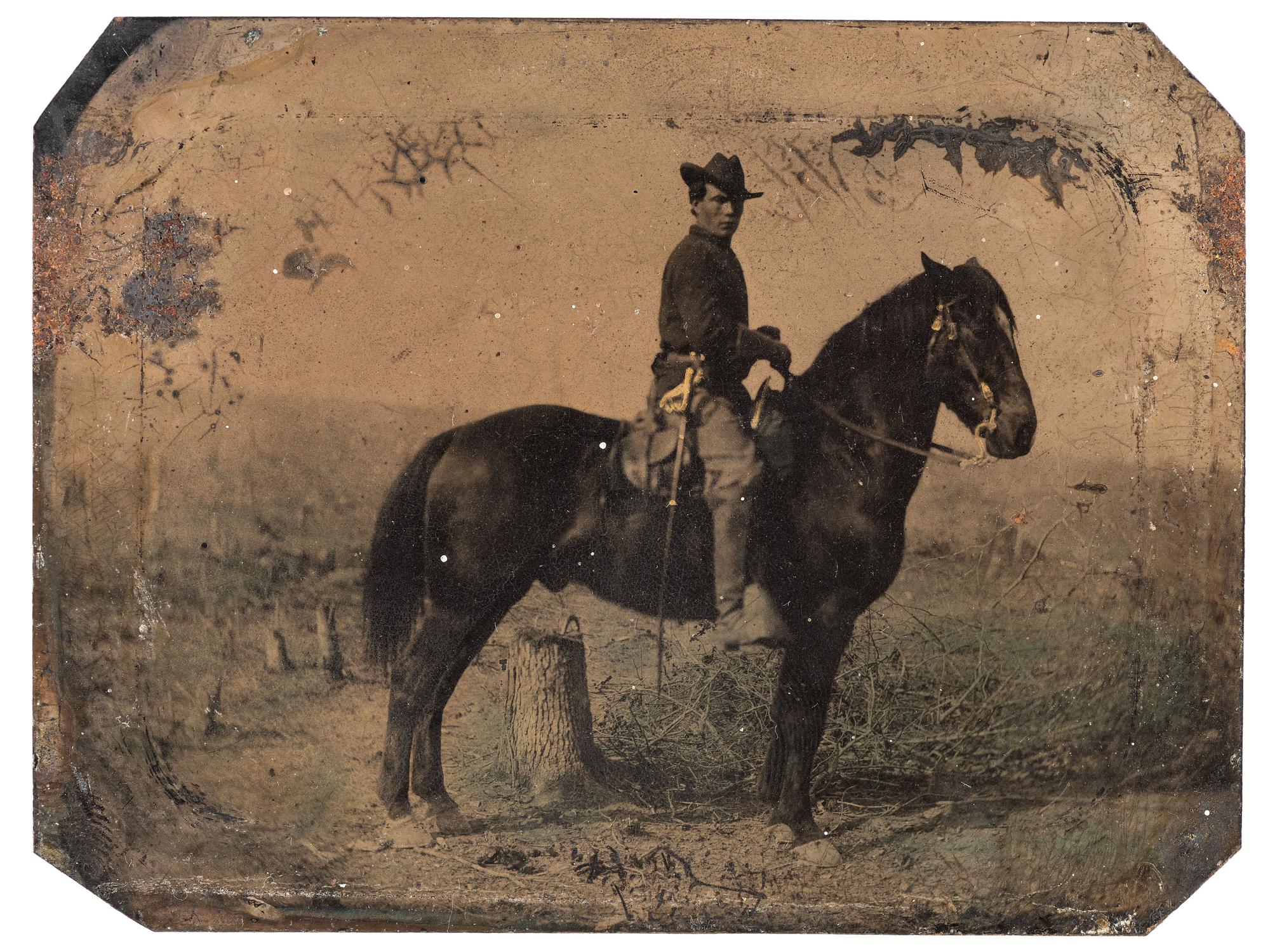 [CIVIL WAR]. Quarter plate tintype of a Federal cavalry soldier on horseback.