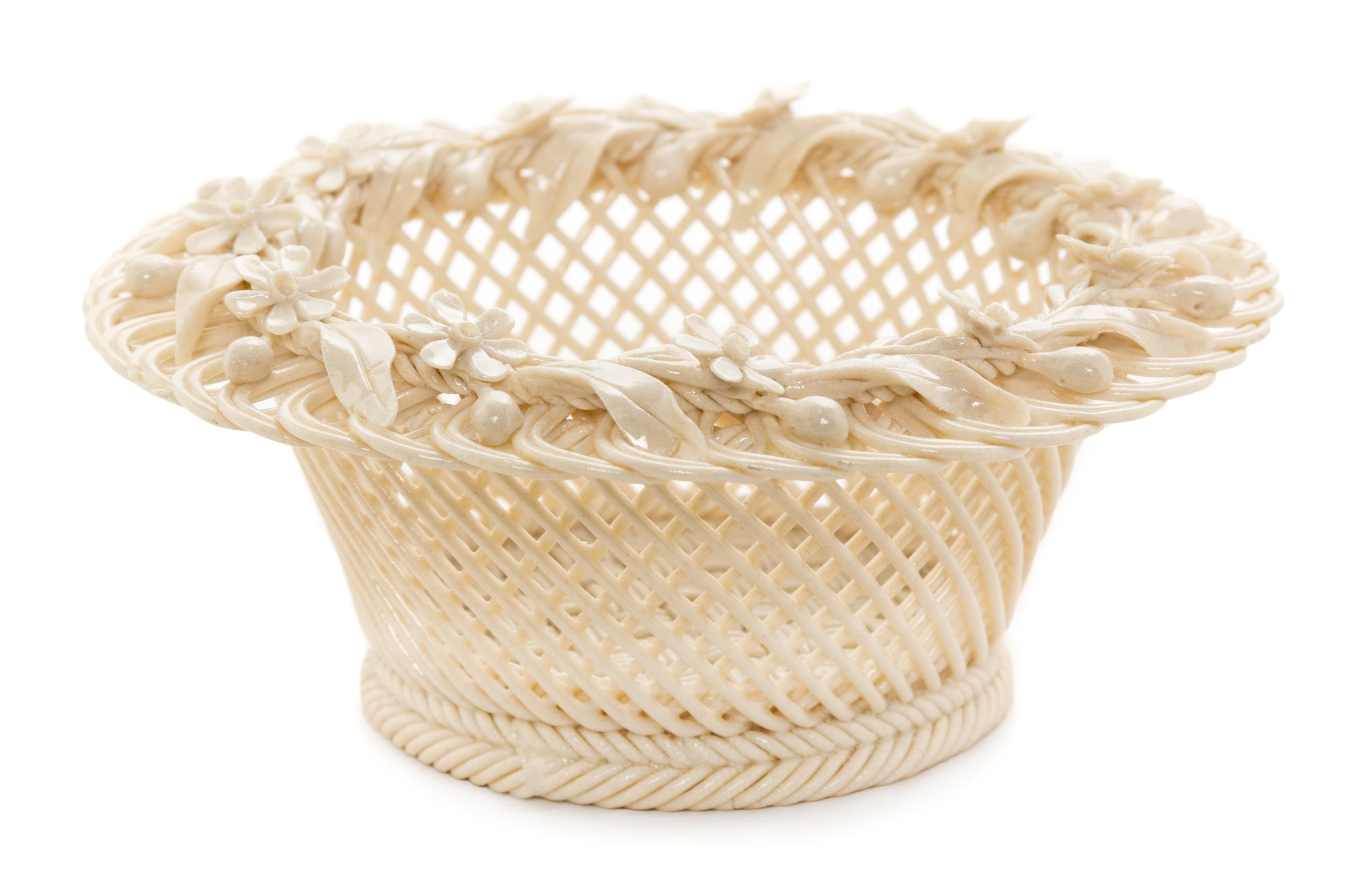 A Belleek Porcelain Basket Diameter 5 1/2 inches.