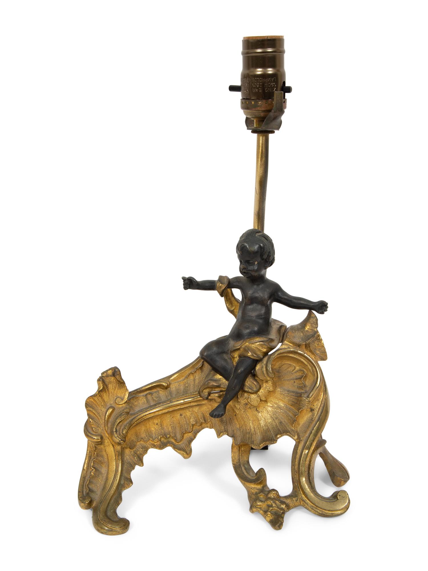 A Louis XV Style Gilt and Patinated Bronze Chenet Mounted as a Lamp