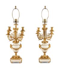 A Pair of Louis XVI Style Gilt Bronze and White Marble Six-Light Candelabra
