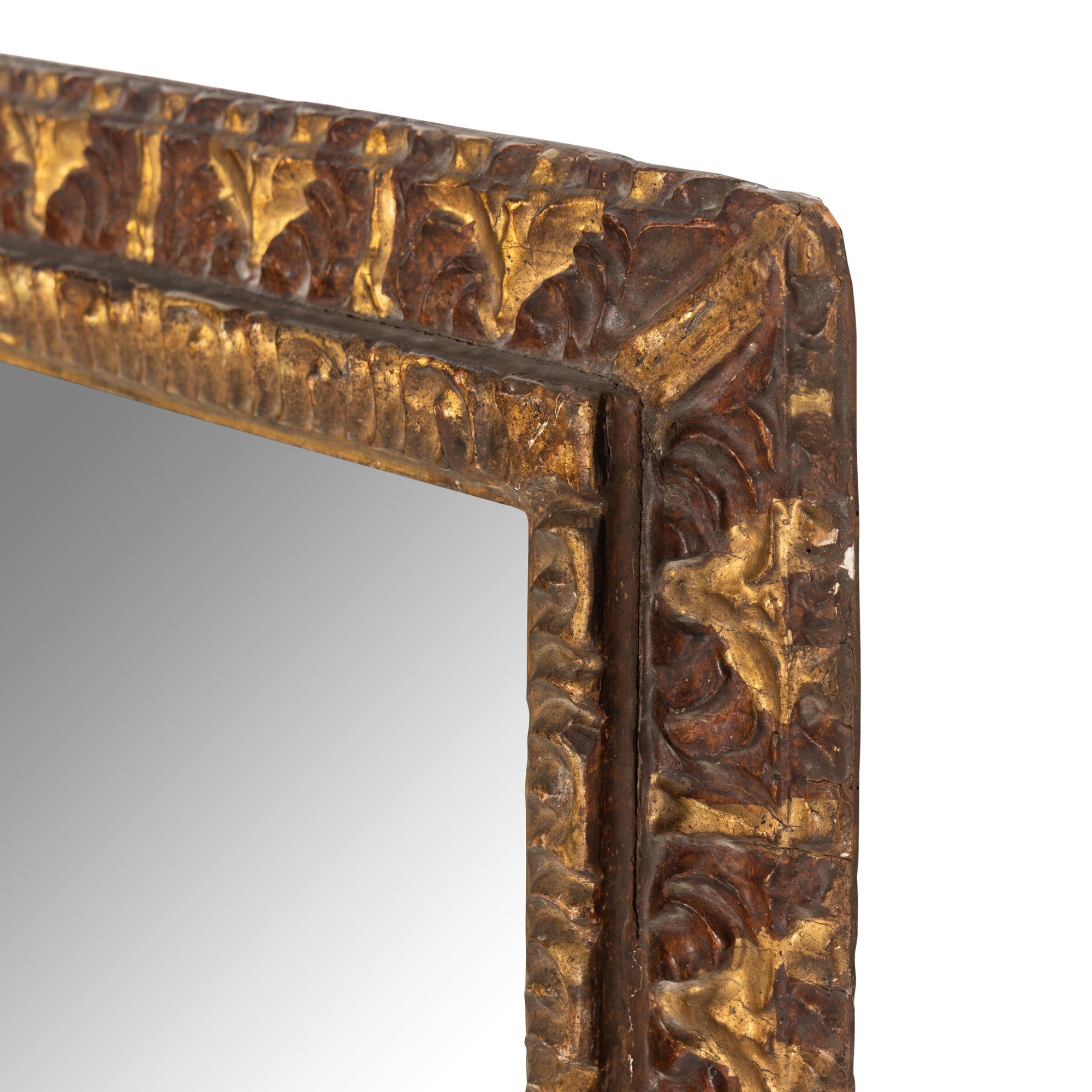 A Spanish Baroque Style Parcel Gilt and Paint Decorated Mirror