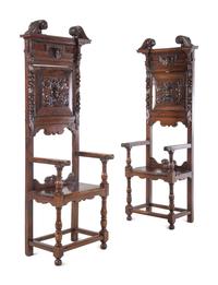 A Pair of Renaissance Revival Carved Walnut Hall Chairs