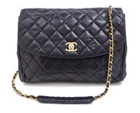 A Chanel Navy Quilted Leather Flap Handbag, 11" x 10" x 3".