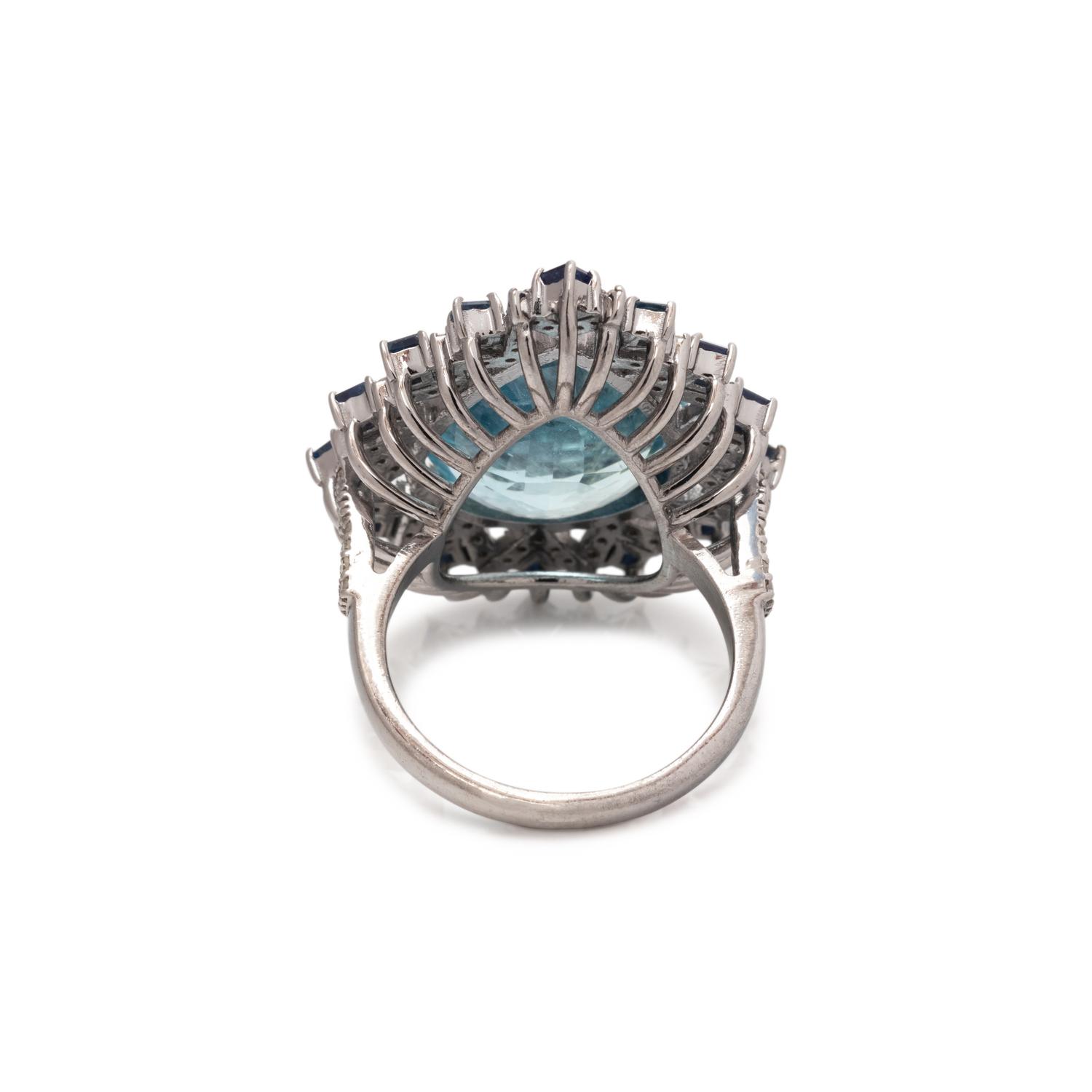 AQUAMARINE, SAPPHIRE AND DIAMOND RING