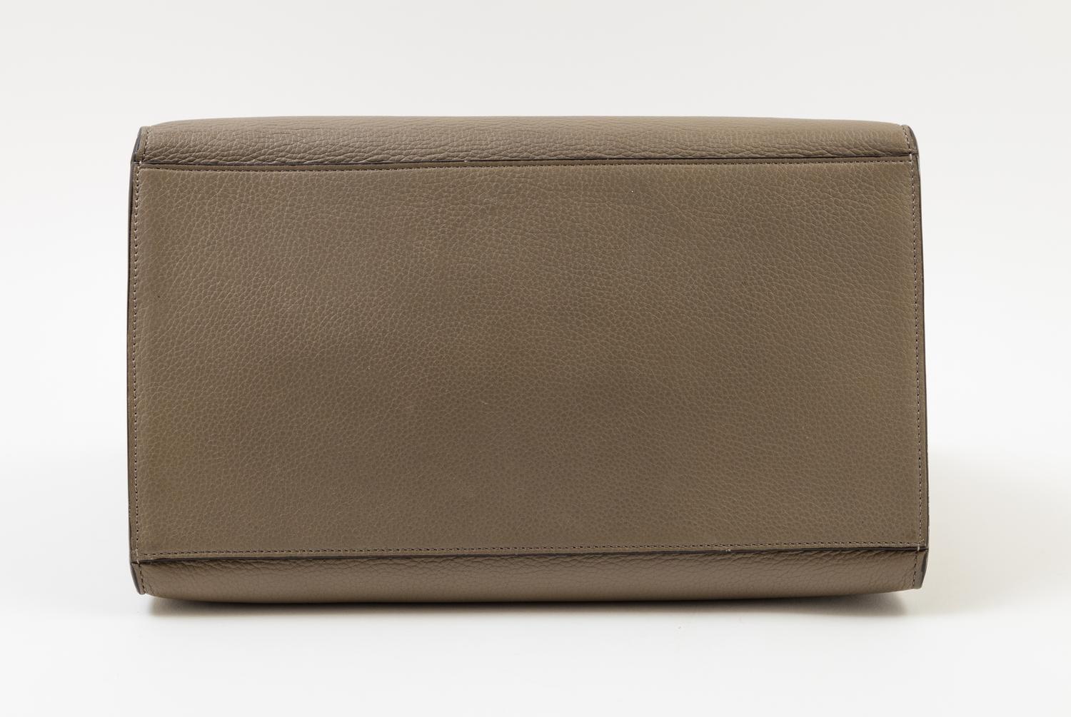 A Celine Taupe Leather and Suede Medium Trapeze Handbag, 11.5"- 20" L x 9" H x 7"- 9" W; Top handle: 4.5"; Strap drop: 15".