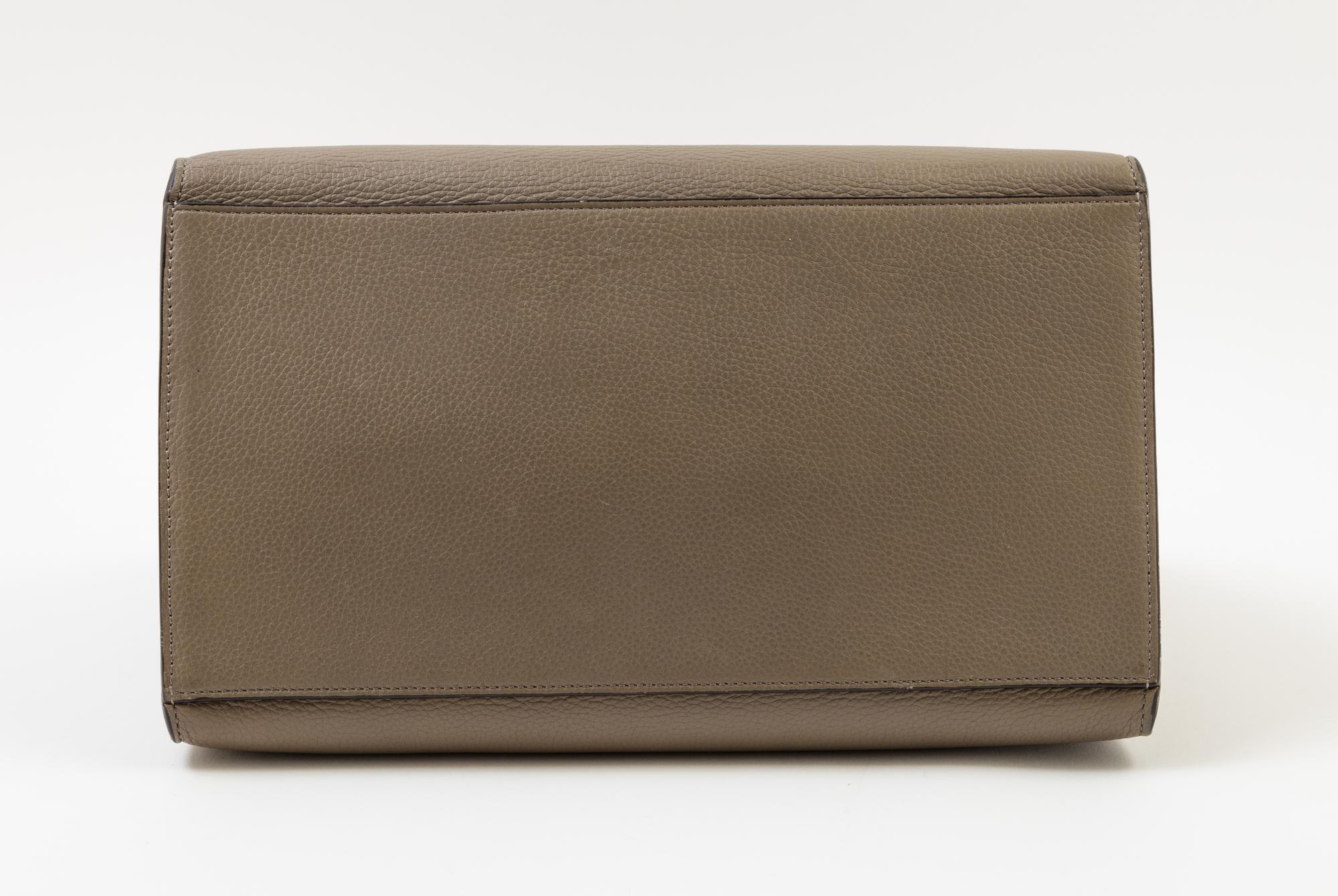 A Celine Taupe Leather and Suede Medium Trapeze Handbag, 11.5"- 20" L x 9" H x 7"- 9" W; Top handle: 4.5"; Strap drop: 15".
