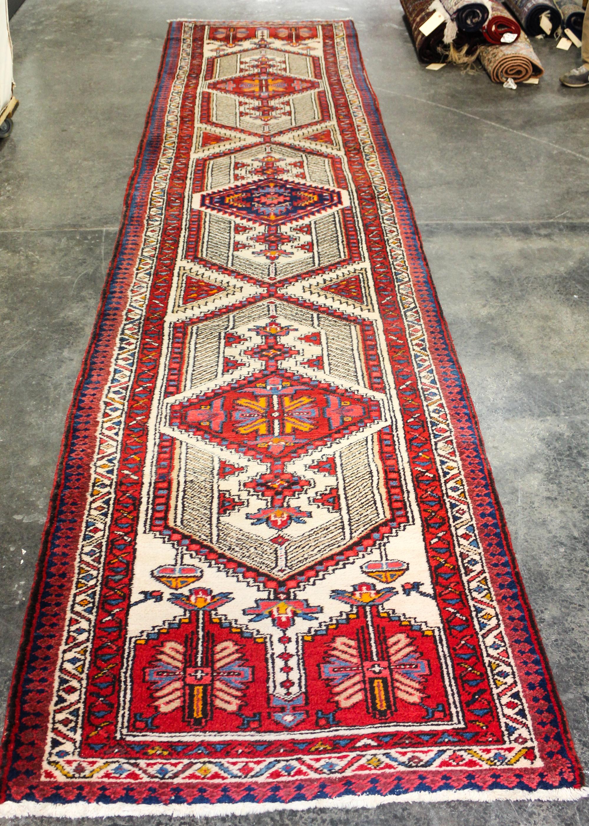 A Persian Runner 14 feet 6 inches x 3 feet 4 inches. — SECOND HALF 20TH CENTURY