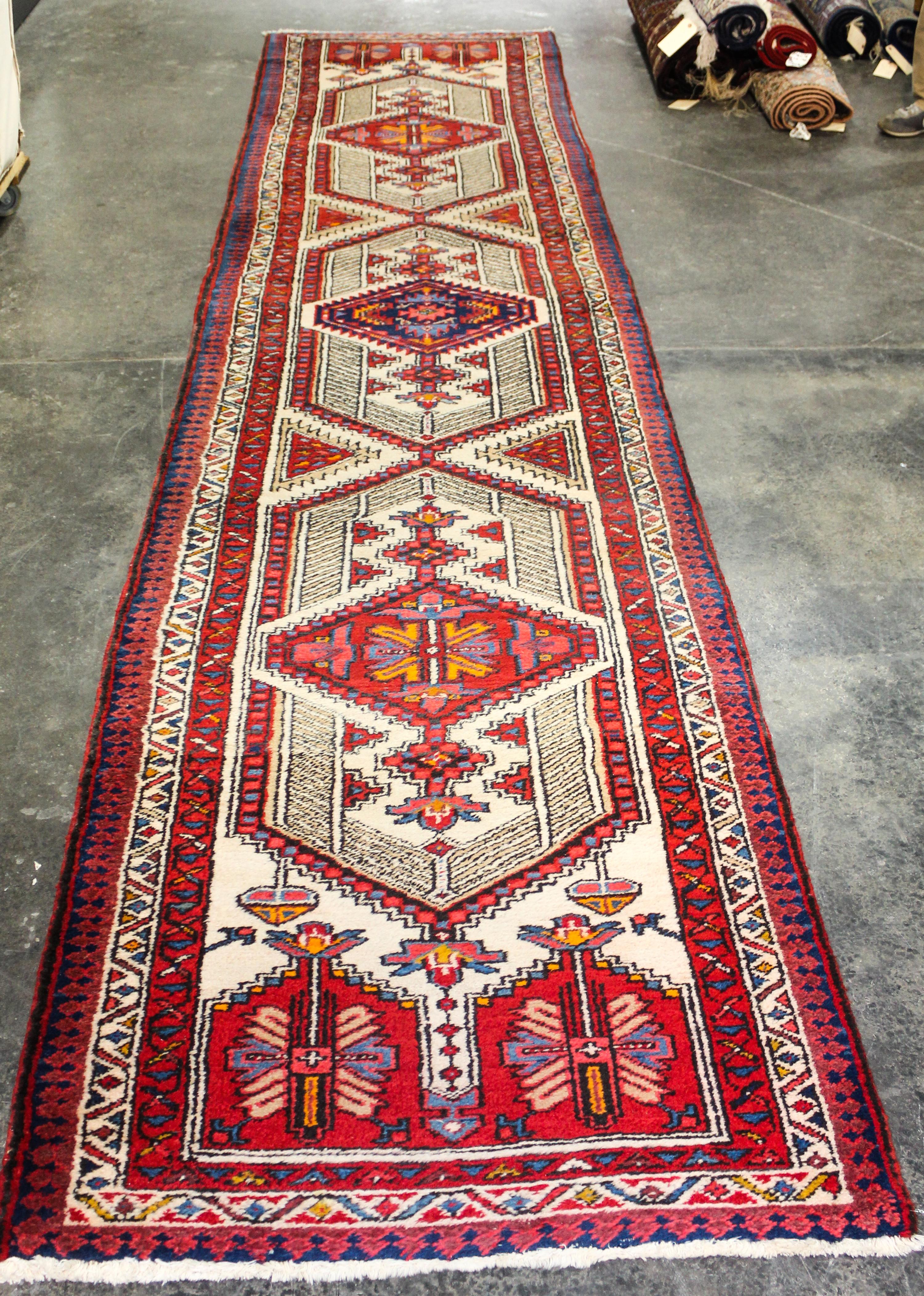 A Persian Runner 14 feet 6 inches x 3 feet 4 inches. — SECOND HALF 20TH CENTURY