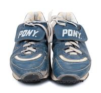 A Pair of Greg Maddux Game Used Pony Cleats,