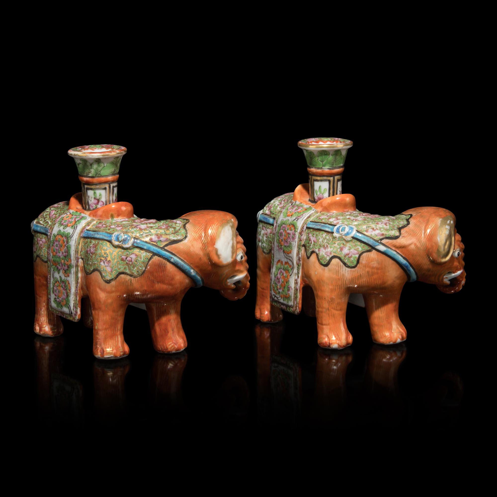 A Pair of Chinese Famille Rose Porcelain Elephant-Form Candle Holders, 19th Century 清晚期 粉彩太平有象燭臺一對