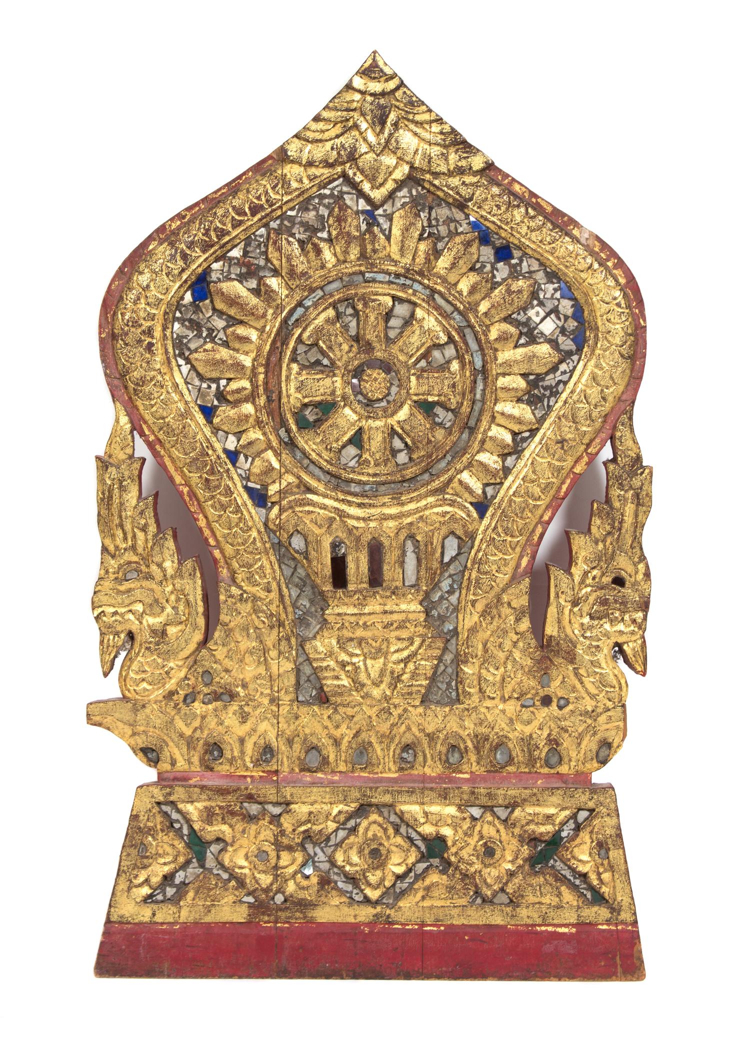 An Indian Carved and Gilt Polychrome Temple Fragment Height 19 inches.