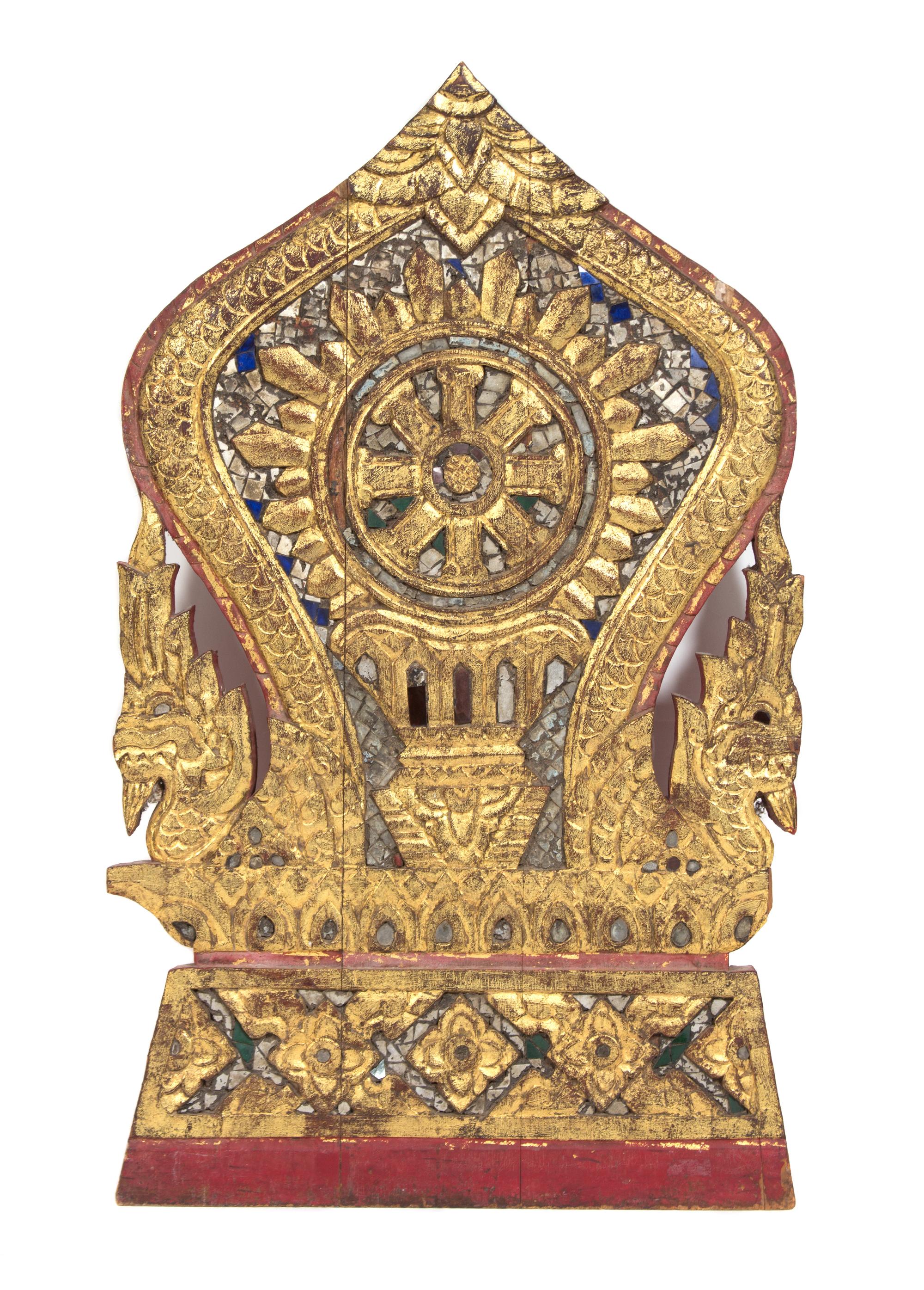 An Indian Carved and Gilt Polychrome Temple Fragment Height 19 inches.