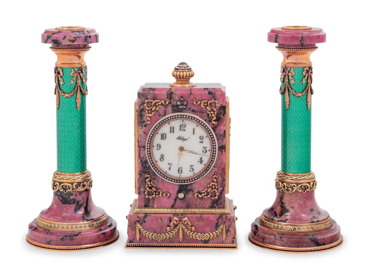 A Carved Hardstone, Enamel, 14-Karat Gold and Hardstone Mounted Three-Piece Clock Garniture