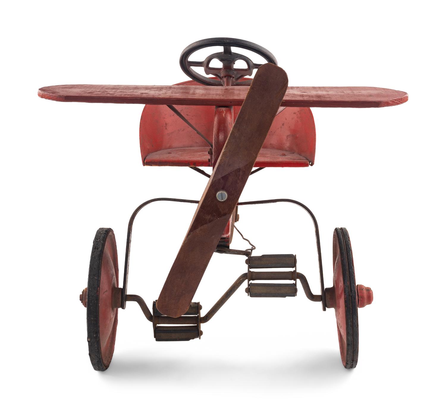 A Red-Painted Airplane Tricycle