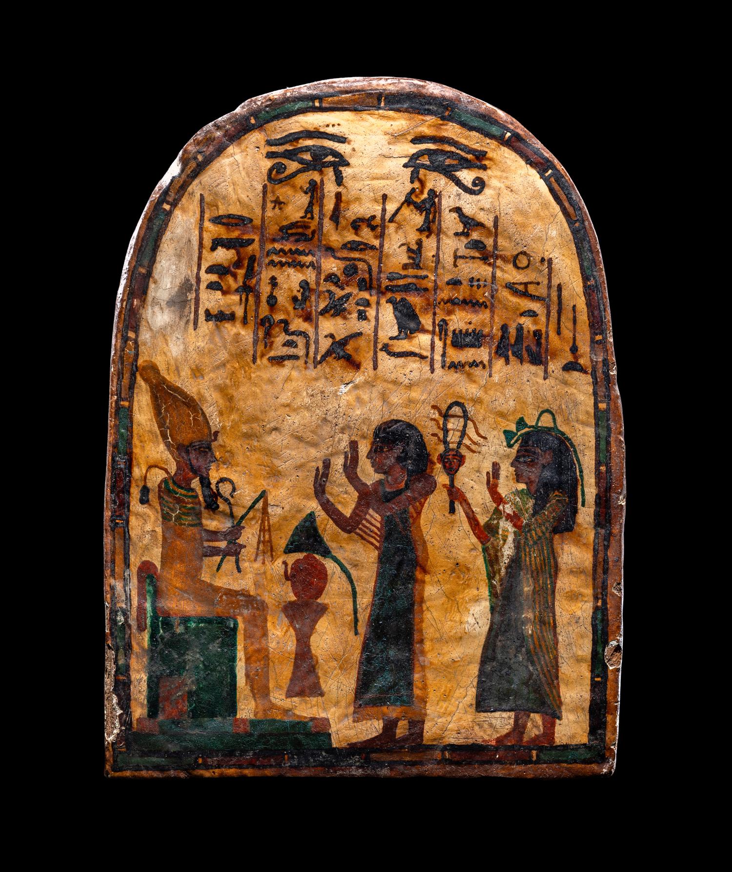 An Egyptian Painted Wood Round-Top Stele