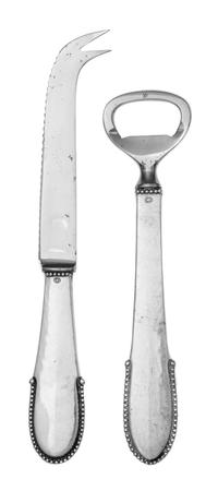 A Danish Silver Bar Set, Georg Jensen Silversmithy, Copenhagen, in the Beaded pattern, comprising a bottle opener and bar knife.