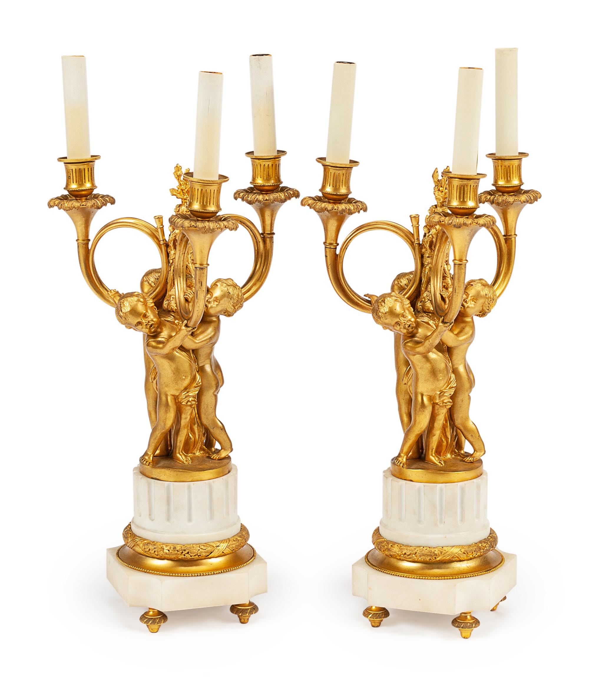 A Pair of Louis XVI Style Gilt Bronze and Marble Three-Light Candelabra