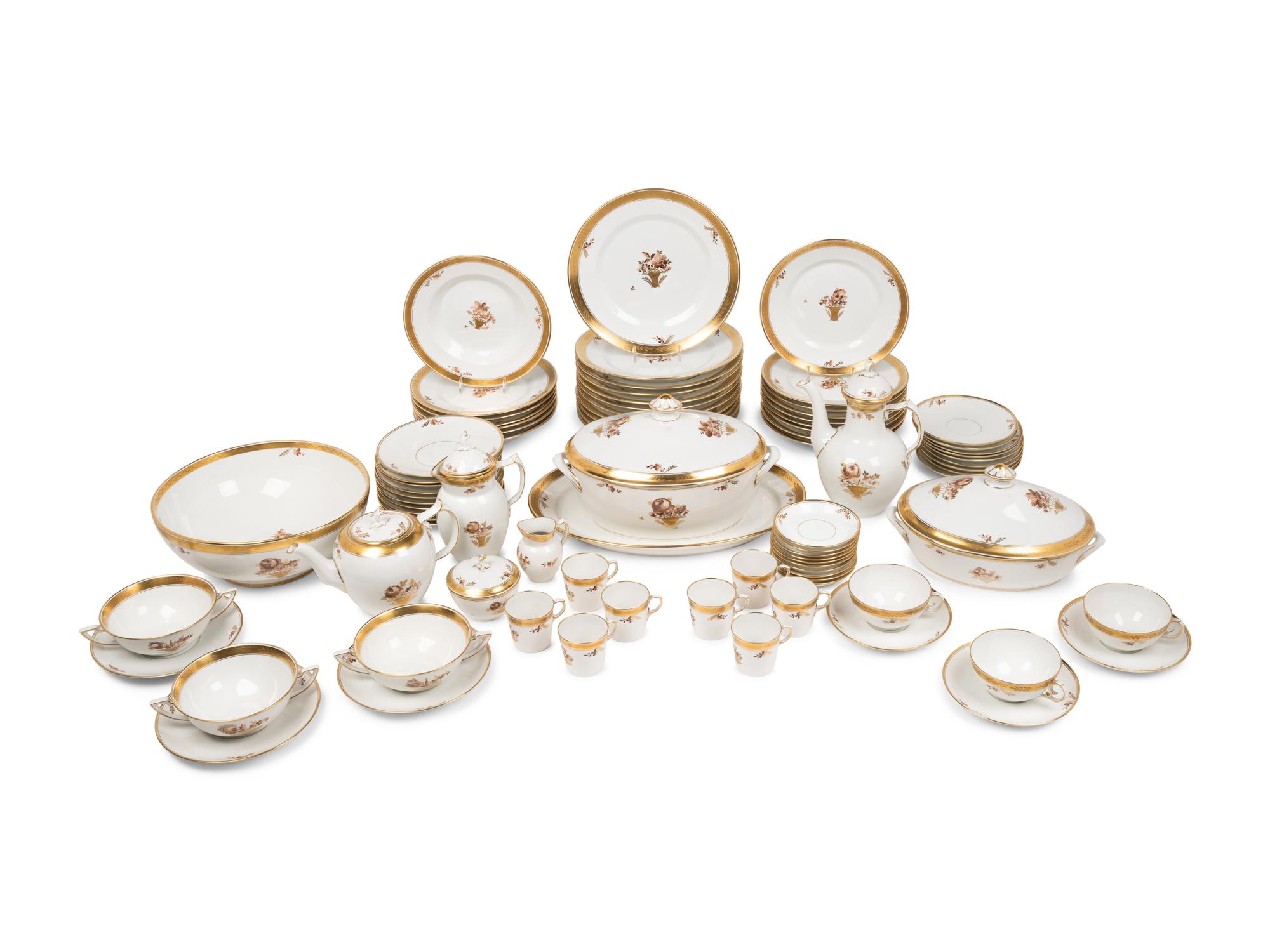 A Royal Copenhagen Golden Basket Porcelain Dinner Service