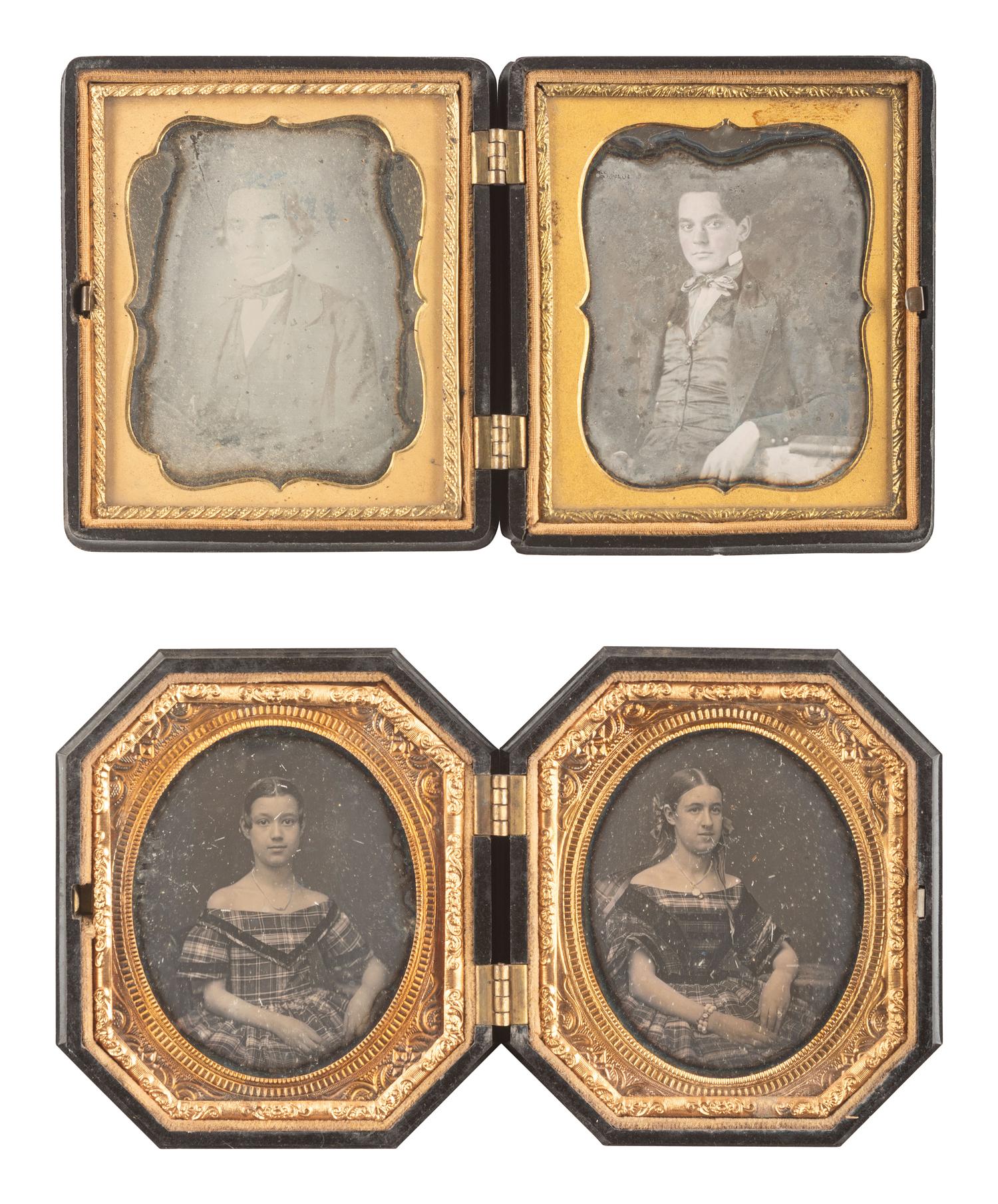 [EARLY PHOTOGRAPHY]. 28 daguerreotypes housed in pairs within side-by-side cases.