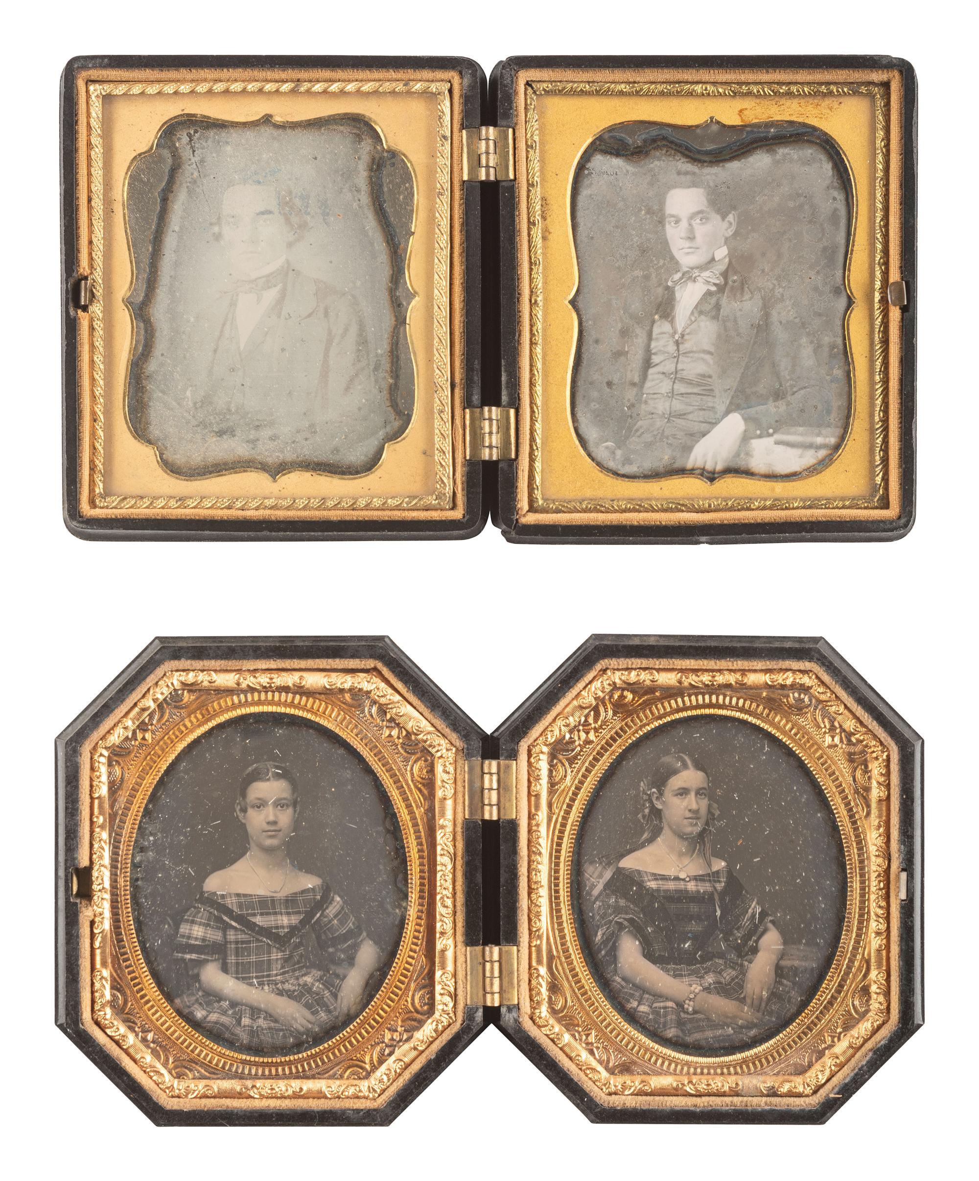 [EARLY PHOTOGRAPHY]. 28 daguerreotypes housed in pairs within side-by-side cases.