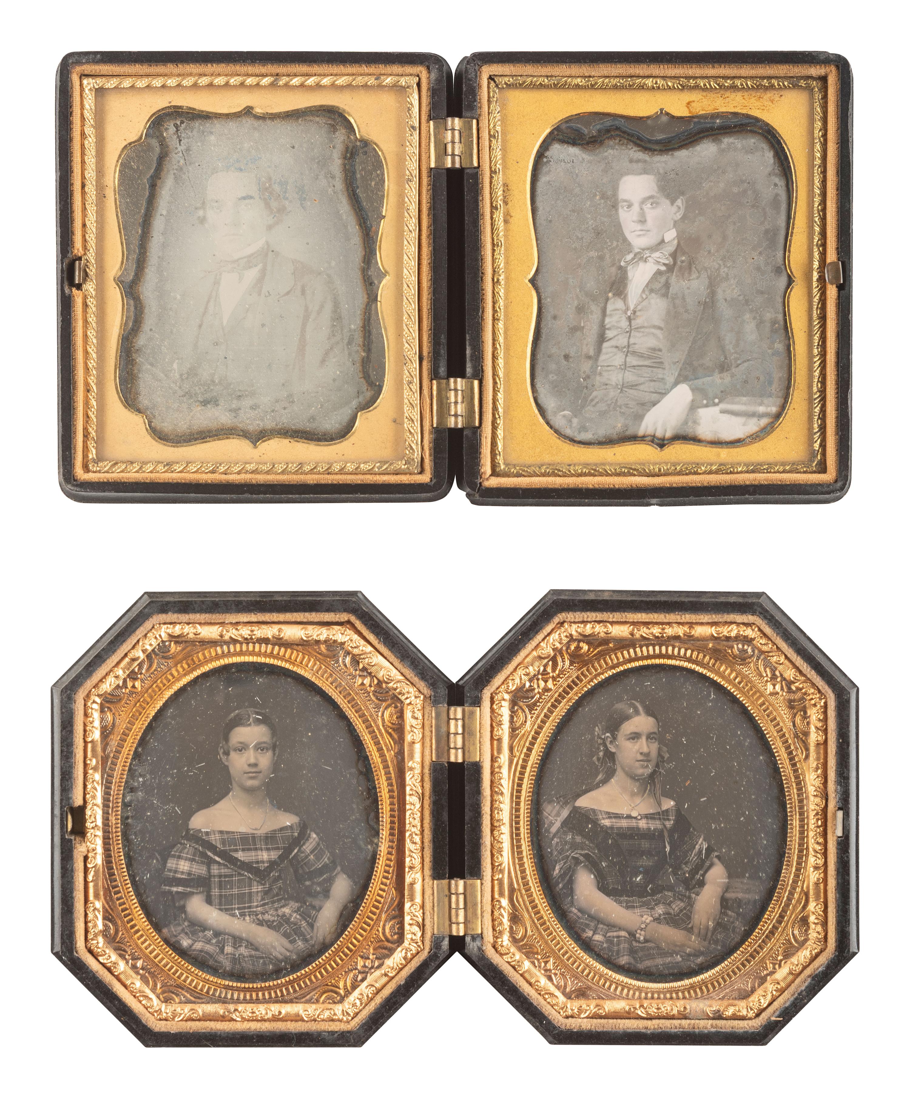 [EARLY PHOTOGRAPHY]. 28 daguerreotypes housed in pairs within side-by-side cases.