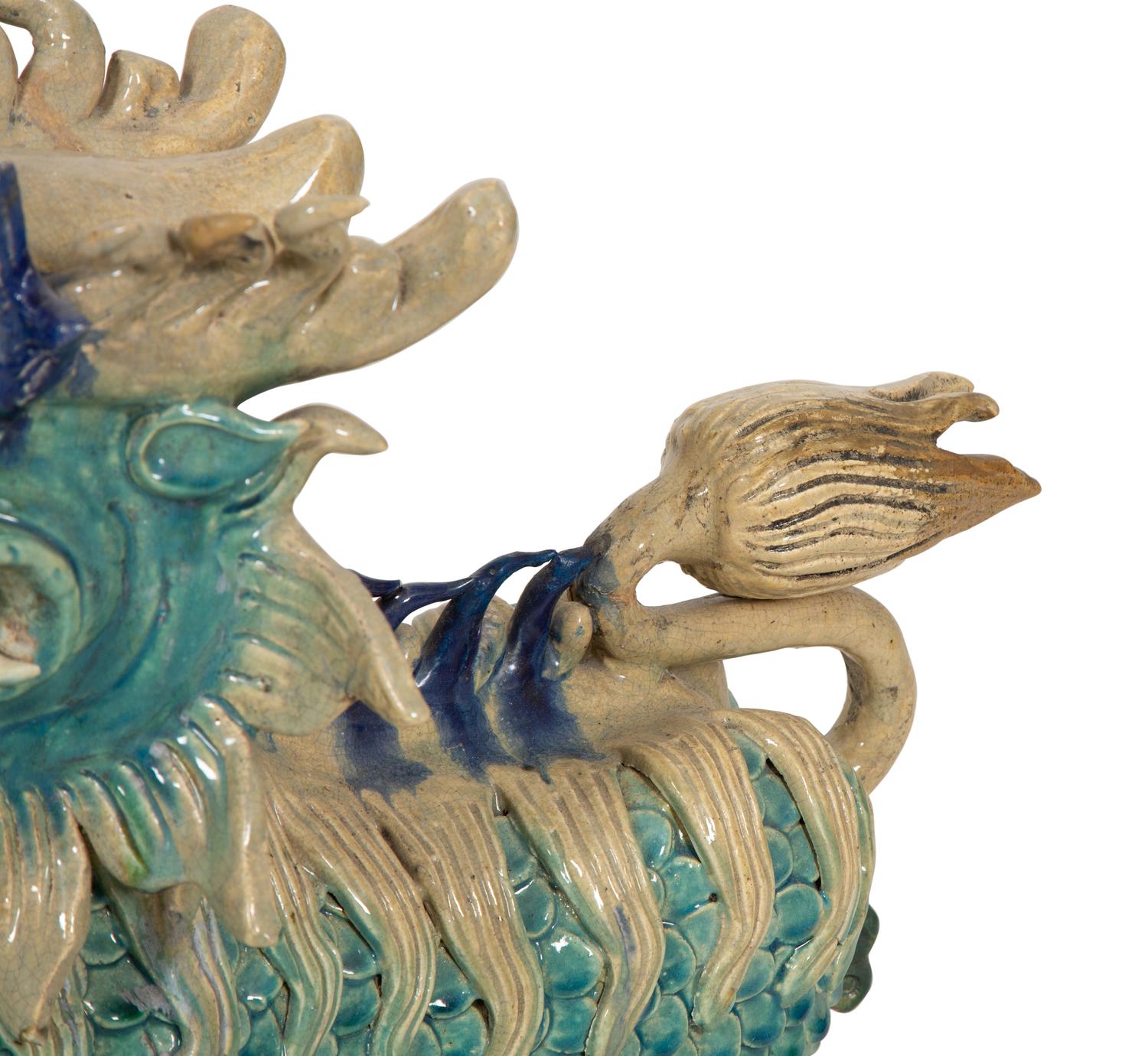 A Pair of Chinese Glazed Ceramic Dragons