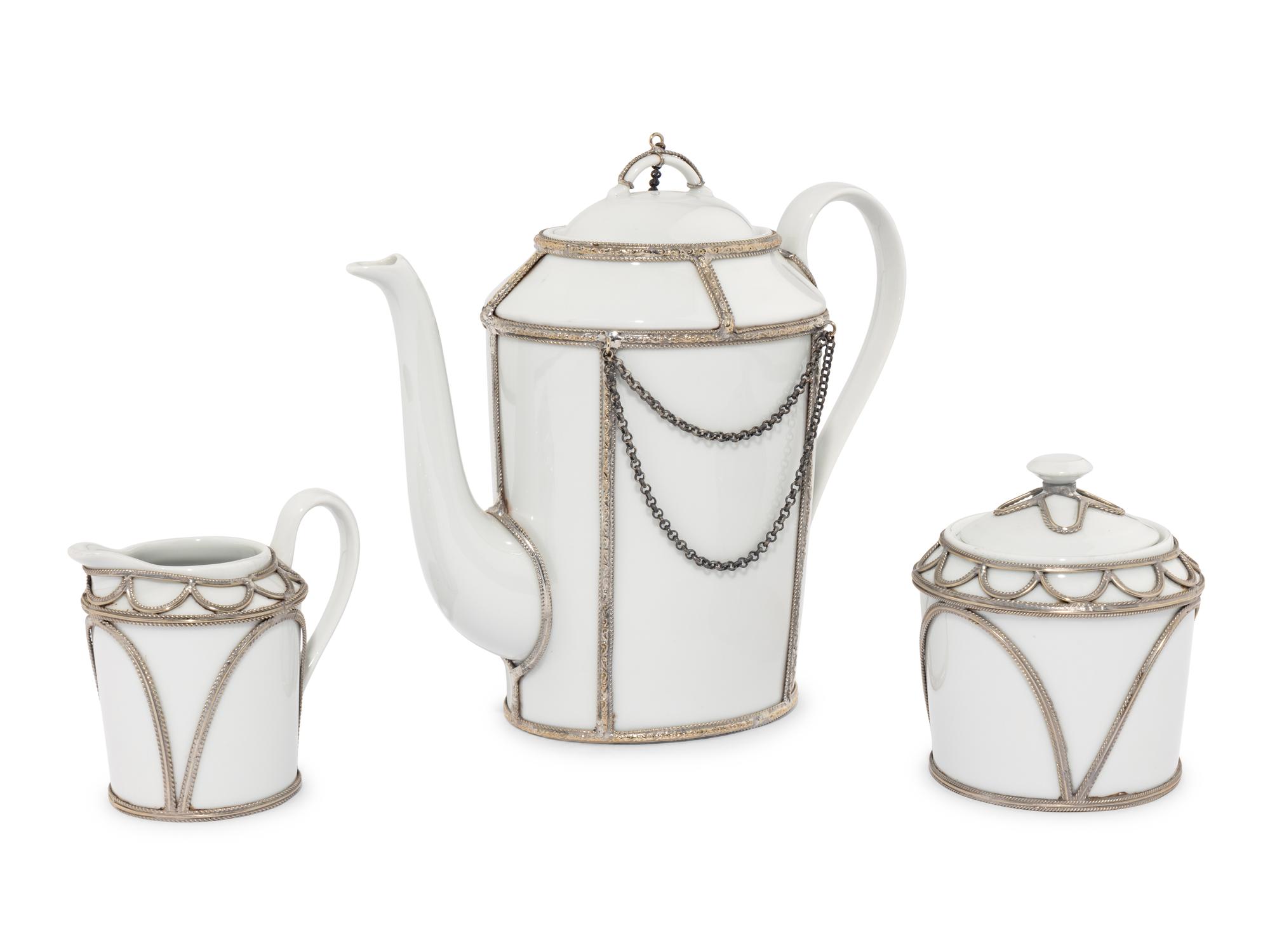 A Martine Goron Limoges Porcelain Three-Piece Tea Service