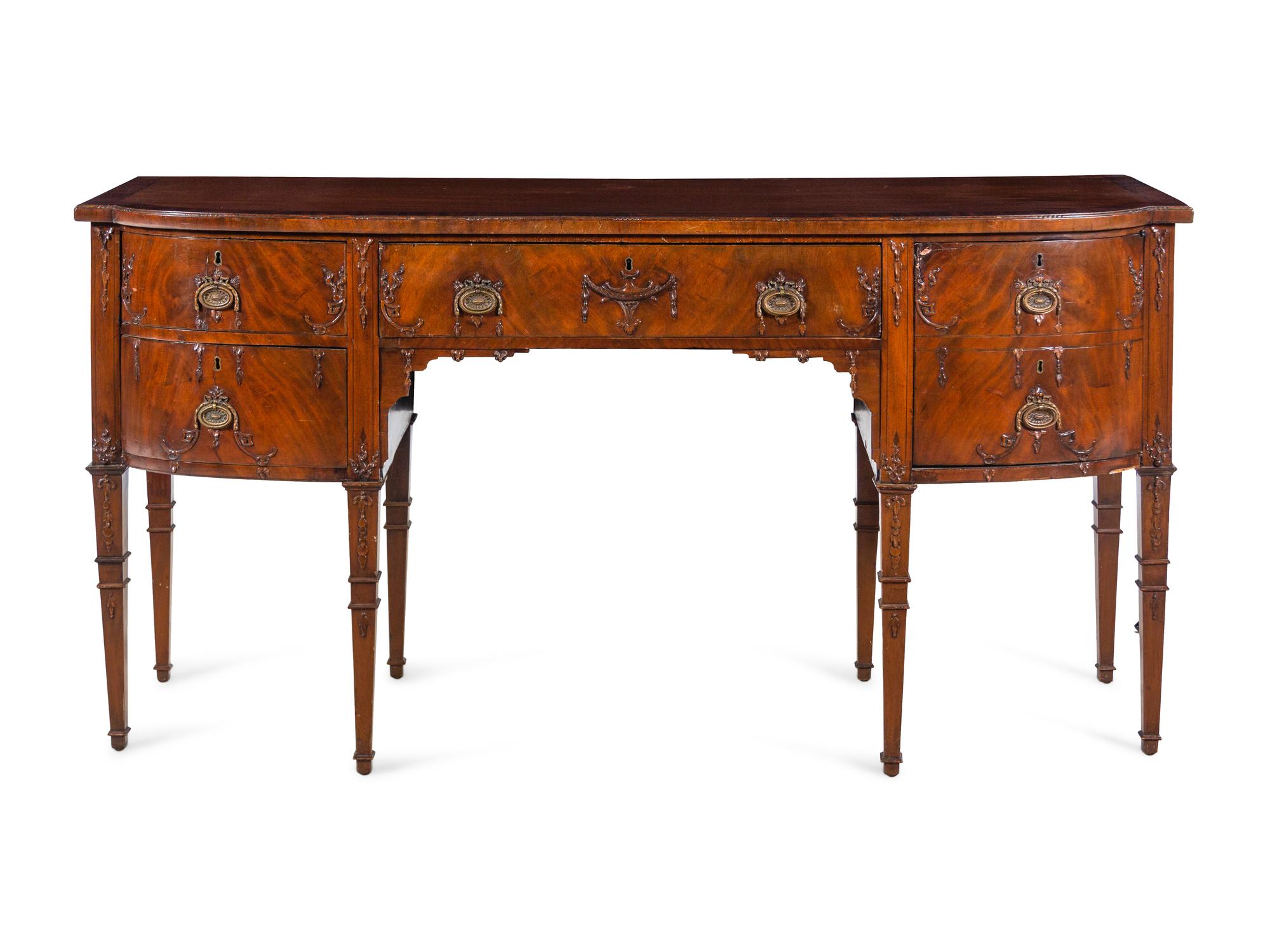An Adam Style Carved Mahogany Sideboard