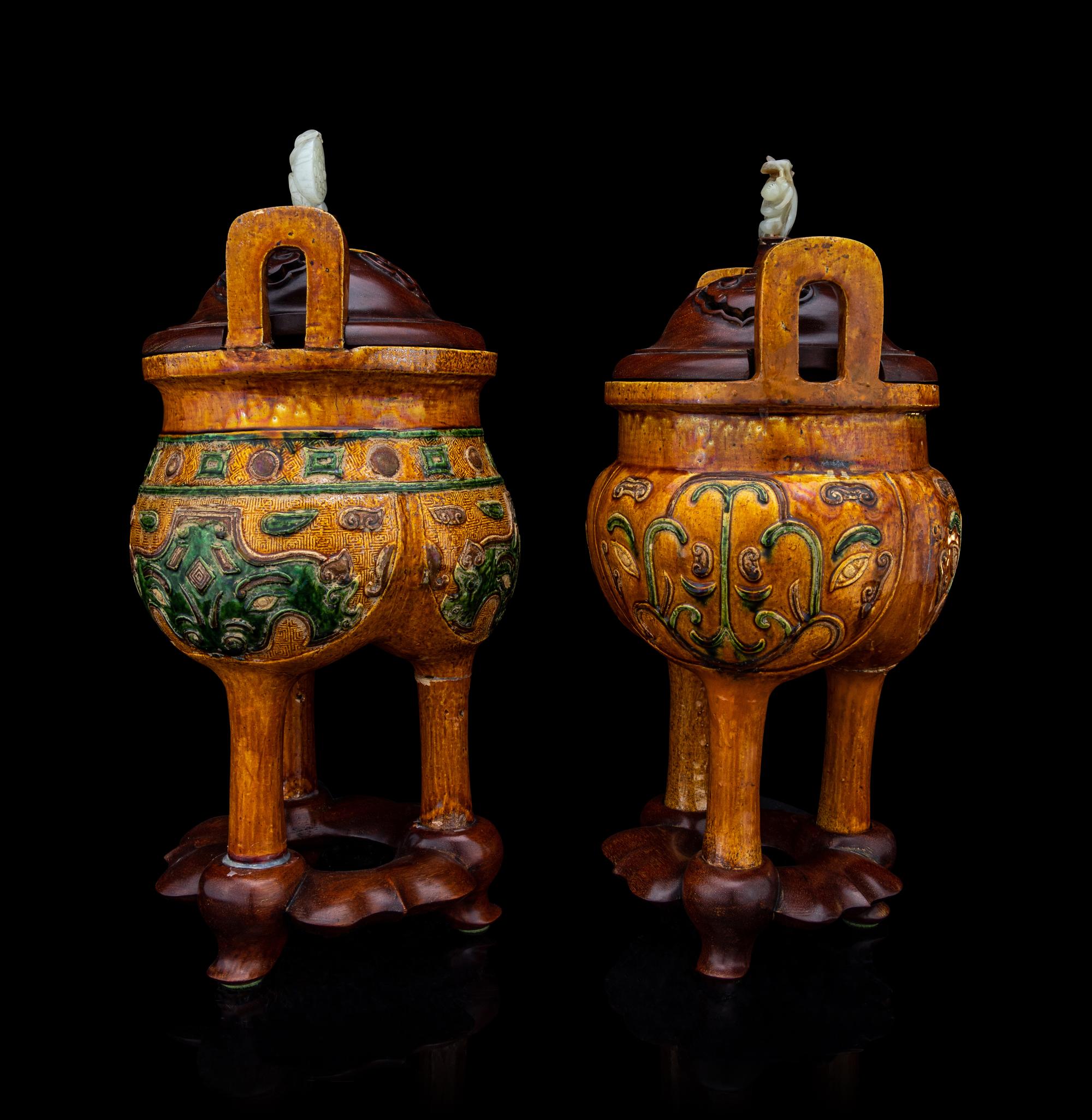 A Pair of Chinese Sancai Glazed Porcelain Tripod Ding Vessels